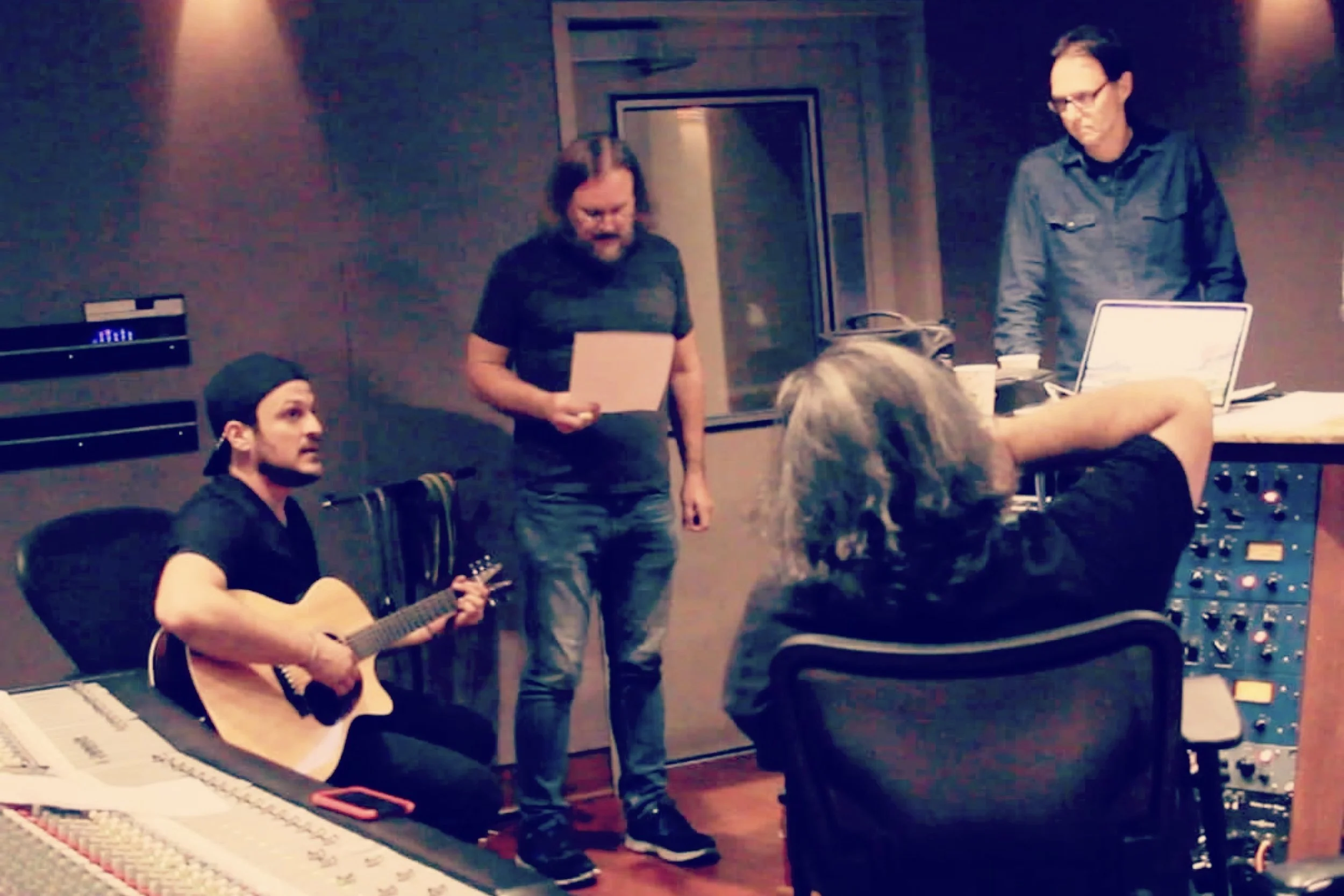 Century Music Group reviewing a song with an artist during a Nashville recording session.
