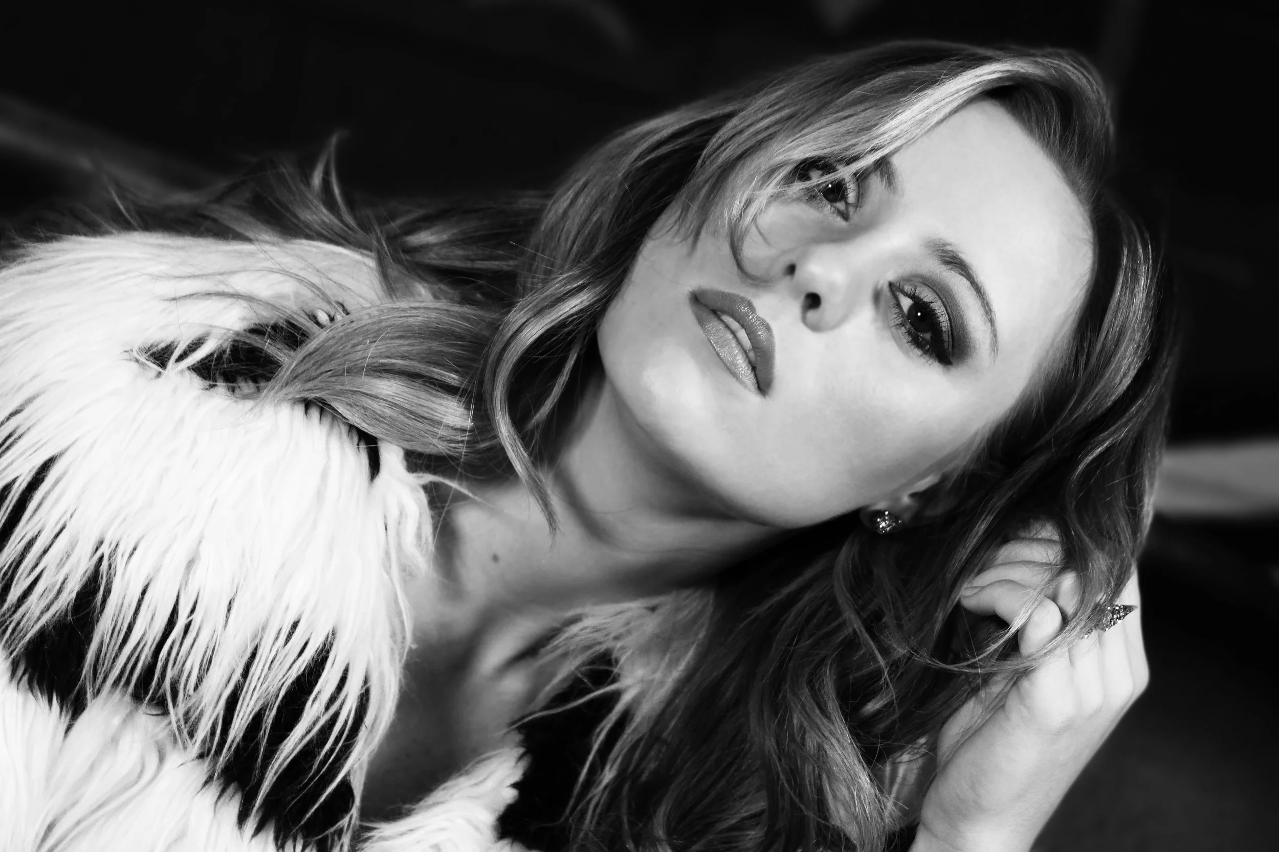 Black and white portrait photography of a female recording artist