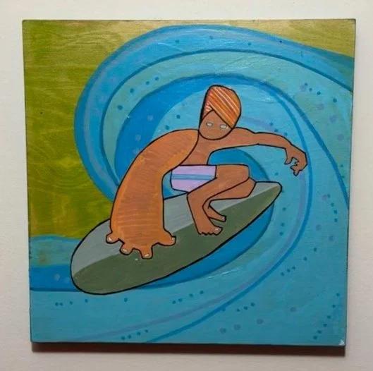 A cartoon-style drawing of a person surfing on a wave, with a green background and a pond-like scene. The surfer has short, orange hair, and is wearing a purple and white bathing suit.
