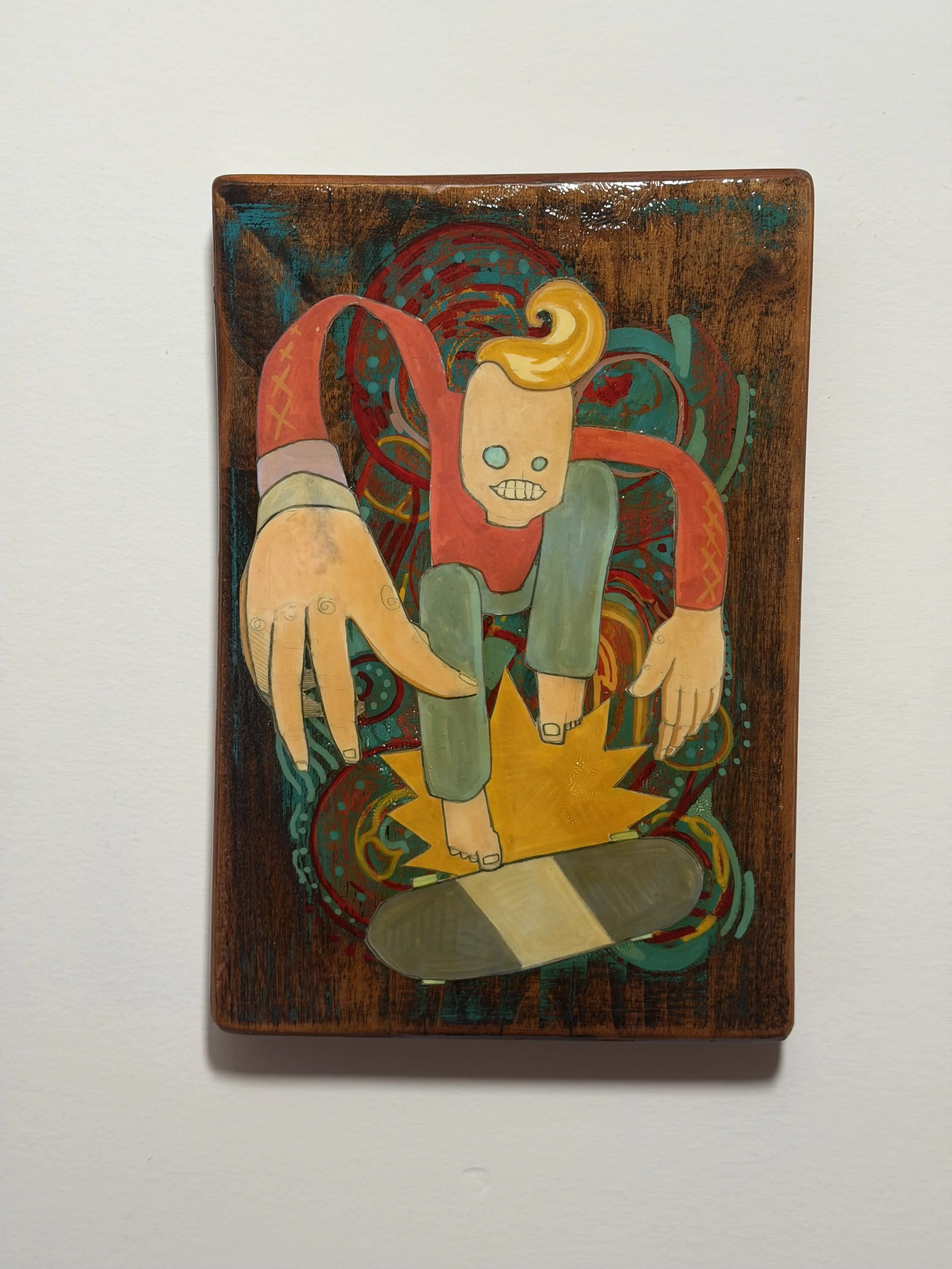 Colorful painting on wood depicting a skeleton with a yellow curl on its head, red and green arms, on a yellow star, with abstract swirls and patterns in the background.