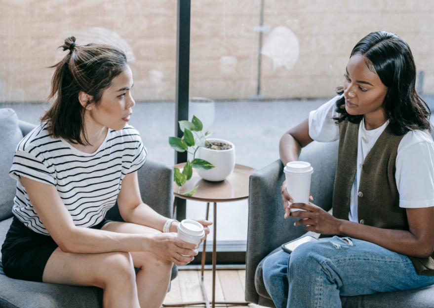 Two adults communicating while learning the difference between caring about feelings and taking responsibility for them.