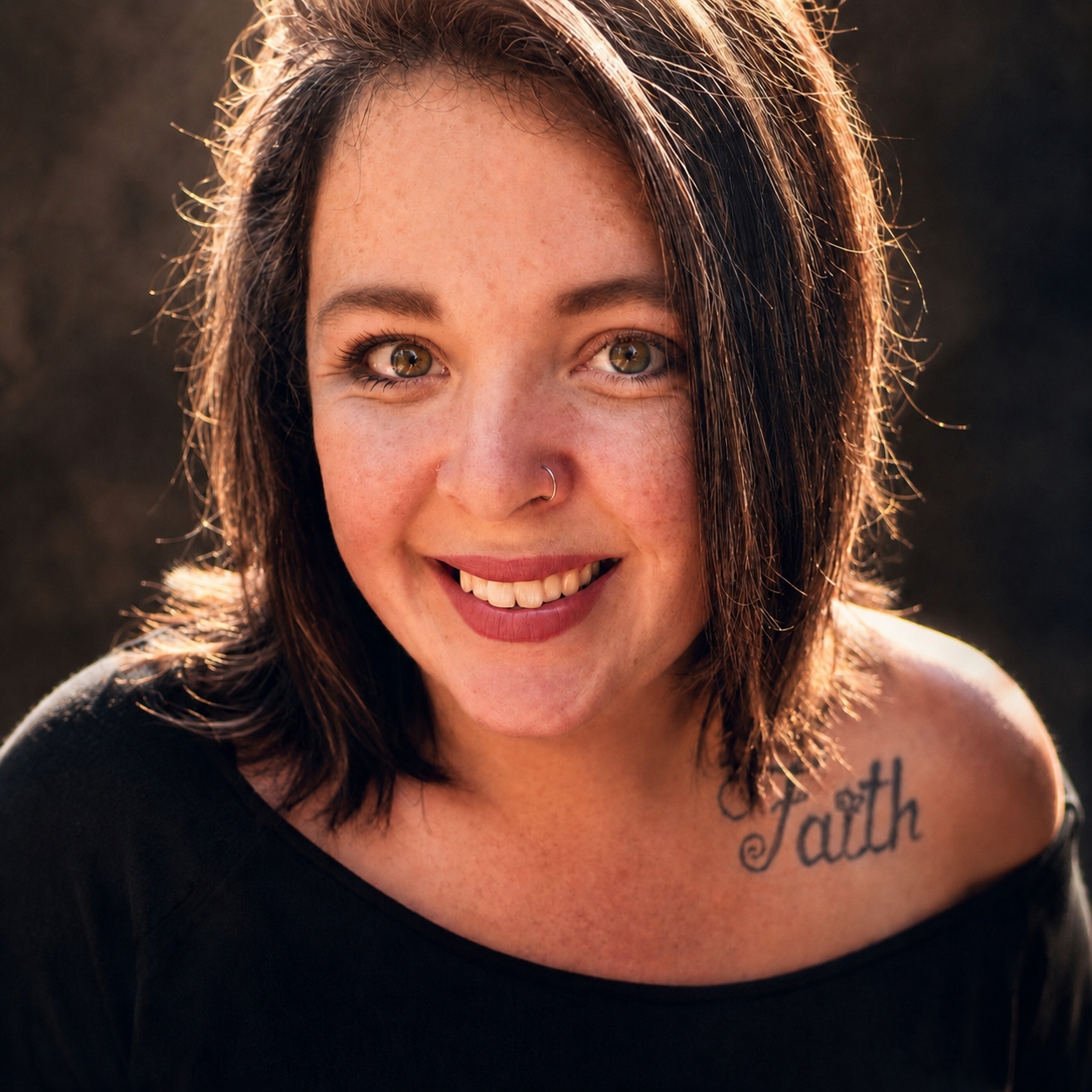 a dark haired smiling woman who is junior intermediate teach at the private school learning hive academy in woodstock