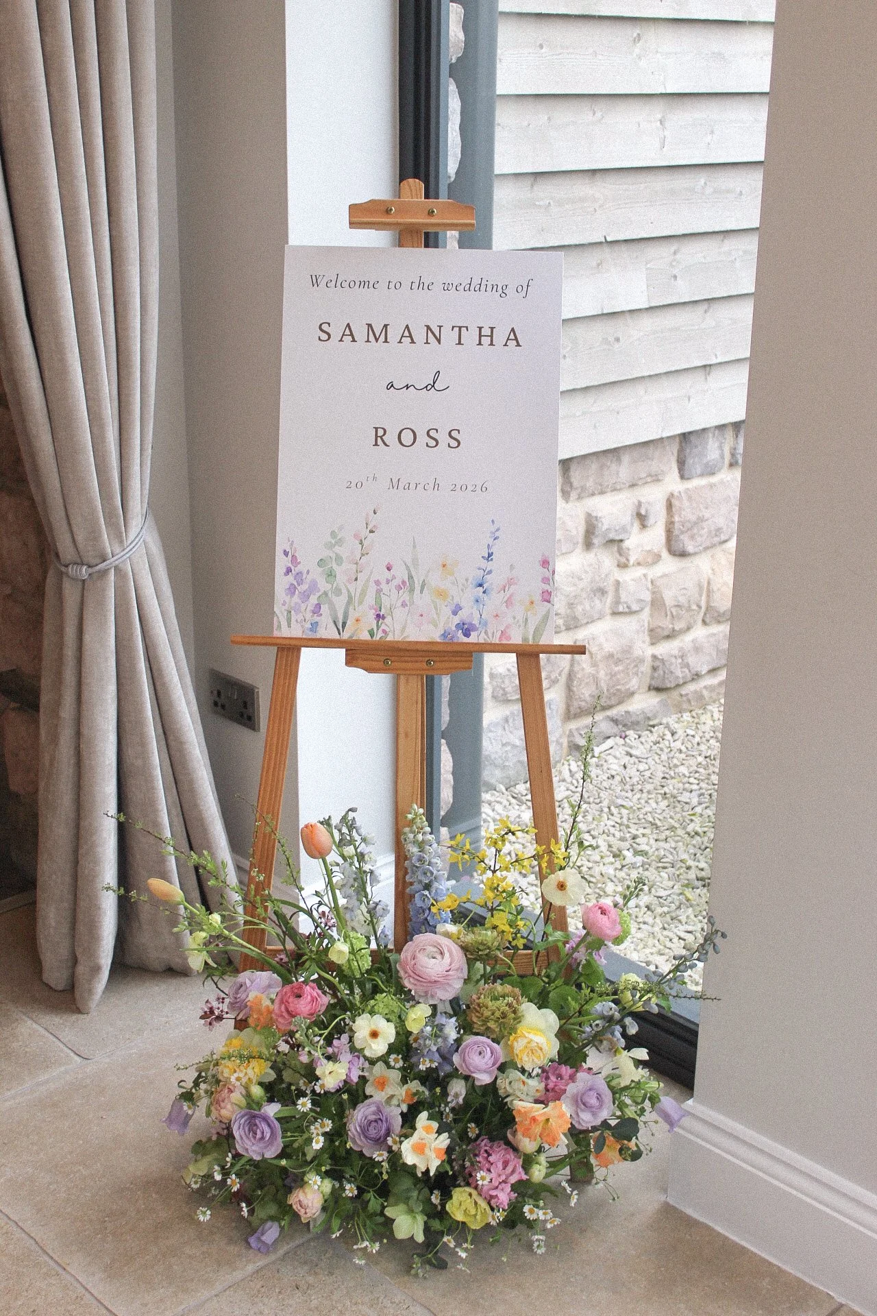 spring welcome sign flowers