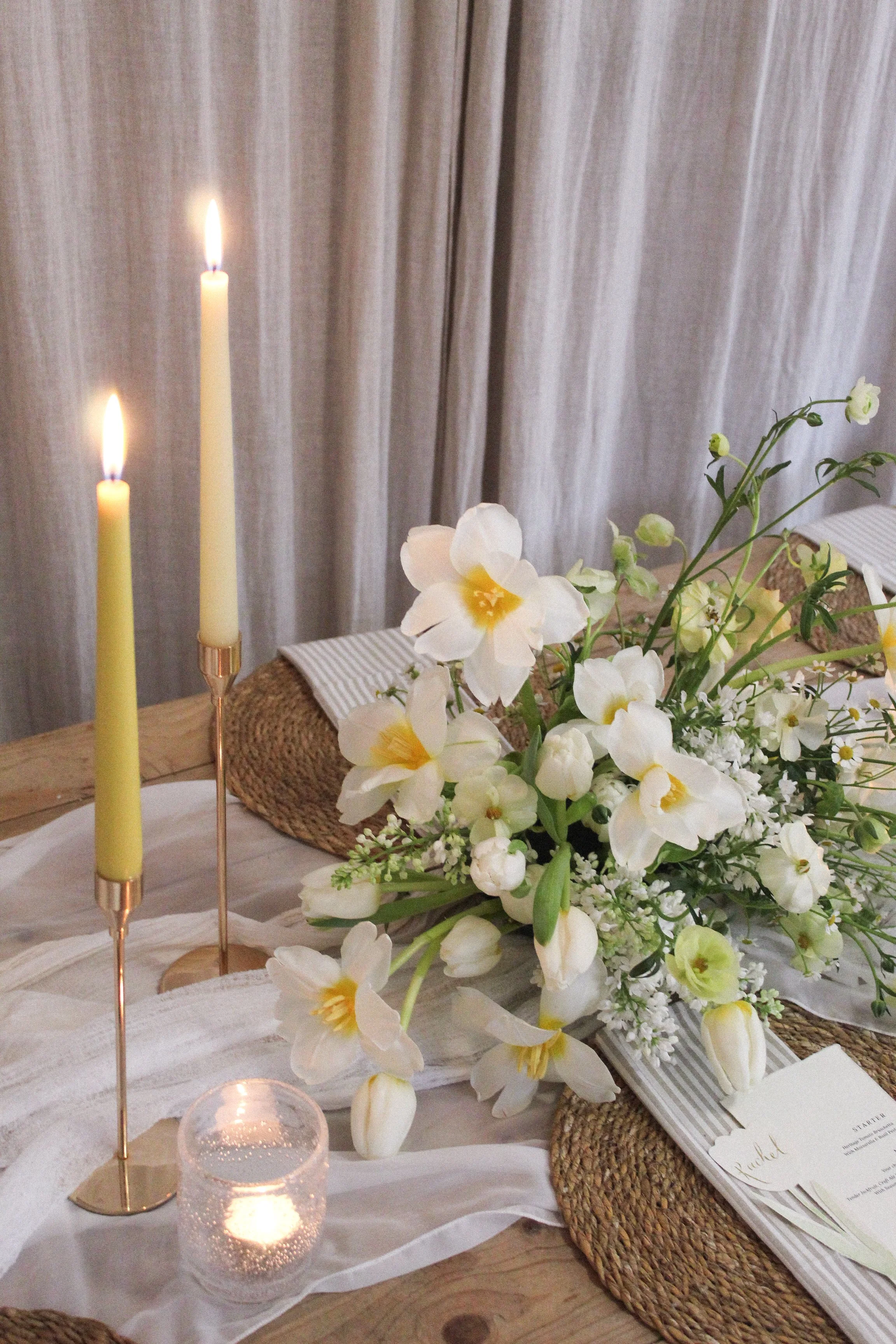 white and yellow table flowers