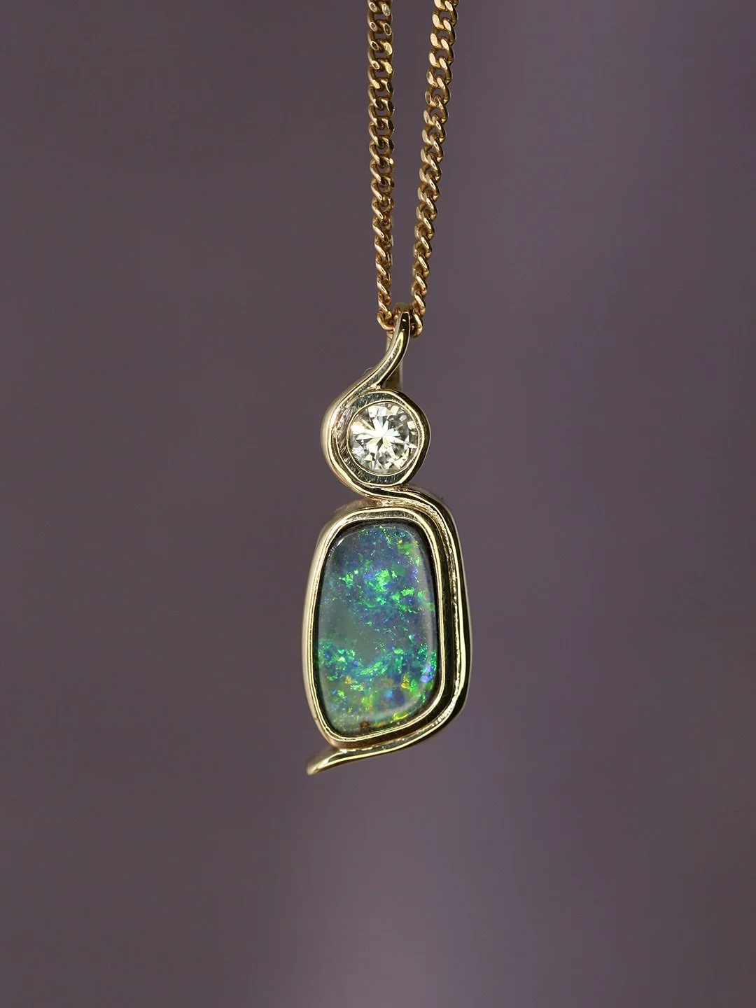 This dreamy opal necklace was made for Paola - a beautiful birthday gift from her loved ones 🥰

She chose a stunning Australian boulder opal, paired with a sentimental diamond and heirloom gold chain - weaving together family jewels to create a mean