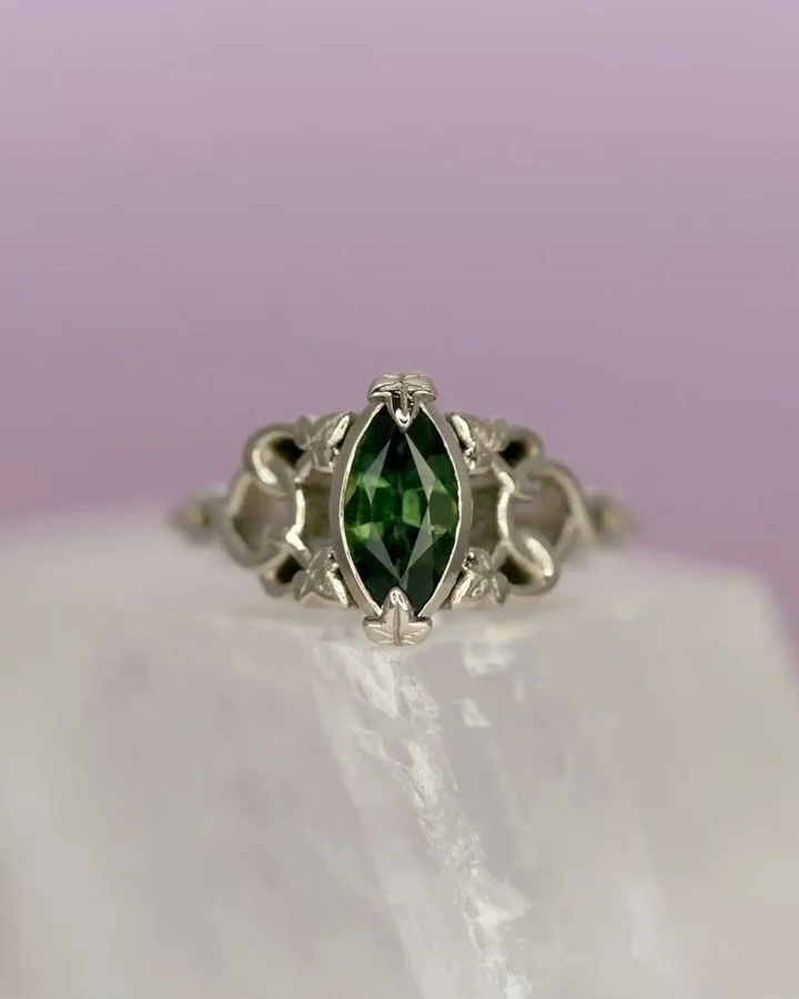 A peek behind the scenes on this custom sapphire and white gold engagement ring, made with love for Ciara &amp; Steffan 💚
.
.
#bespokeengagementring #glasgowjeweller #celticknot #botanicaljewellery #greensapphire #marquisering #scottishjewellery