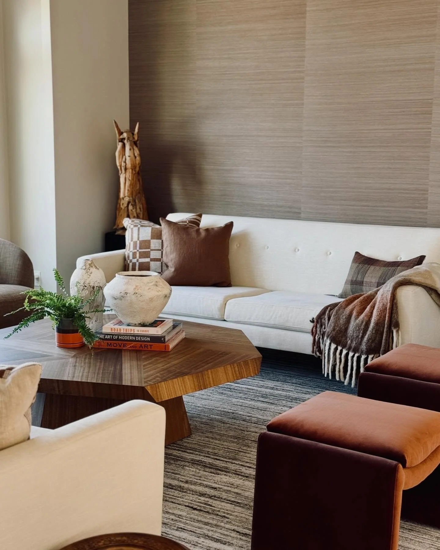 Swipe to see how this space looked before we gave it a much needed refresh. 

This living room had all the right intentions&mdash;but the wrong proportions. The rug was too small, the art felt undersized, and the tables didn&rsquo;t quite meet the sc