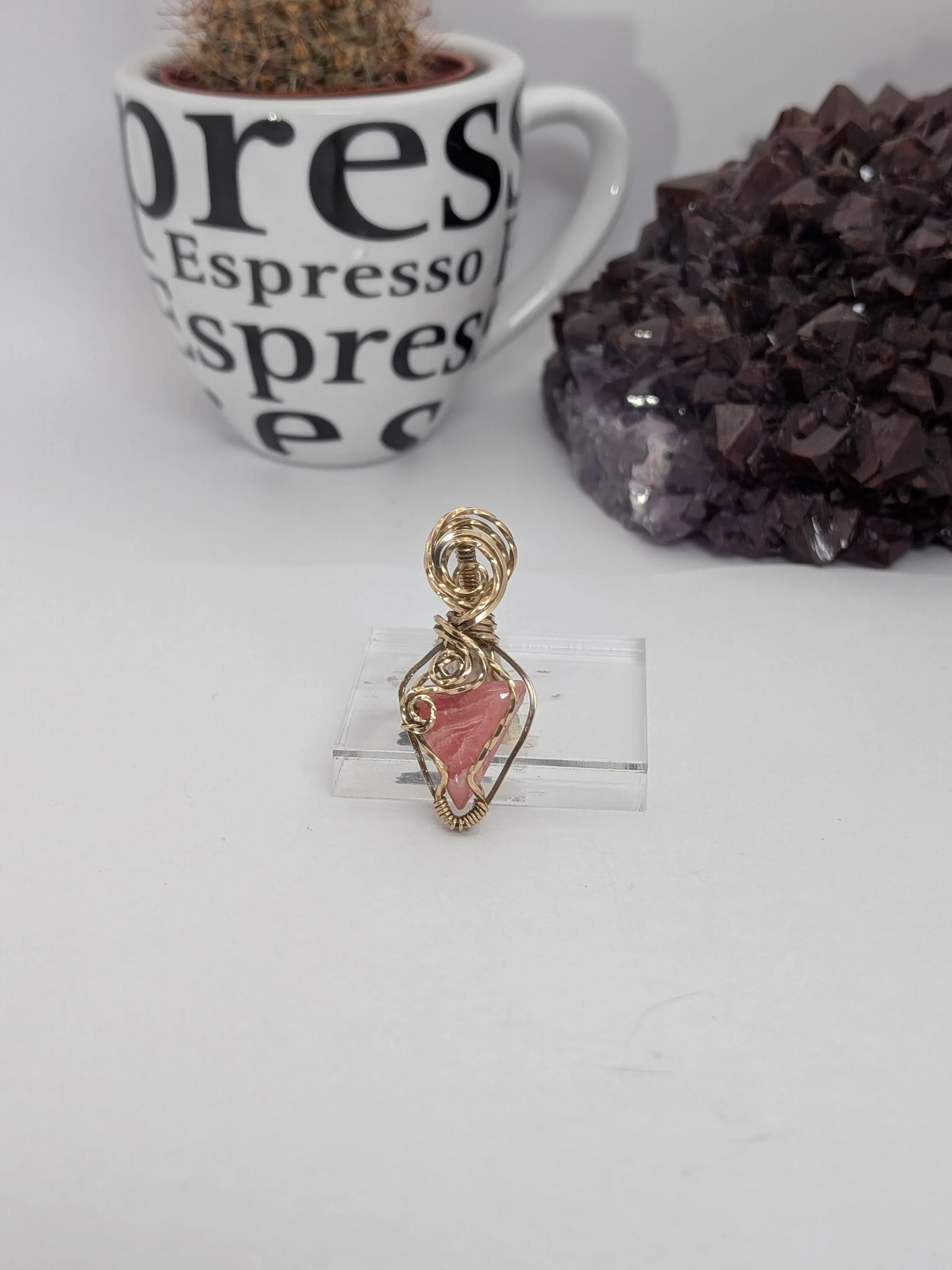 Gorgeous petite gemstone pendant, intricately wire-wrapped and accented with a heart-style bail, beautifully highlighting the stone as the centrepiece.