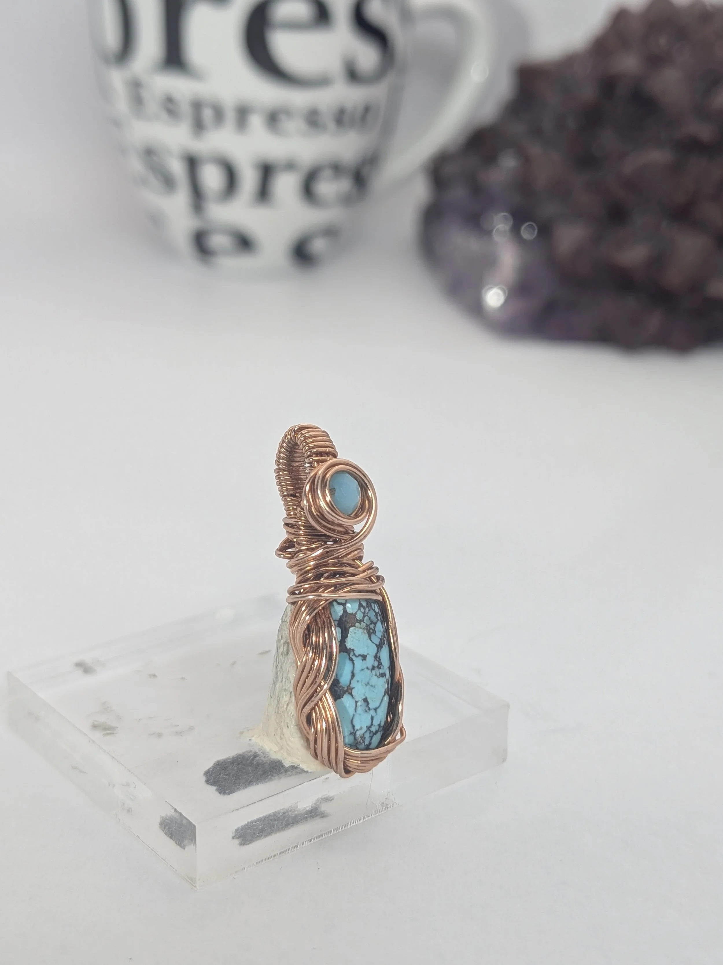 Gorgeous petite gemstone pendant, intricately wire-wrapped and accented with a heart-style bail, beautifully highlighting the stone as the centrepiece.