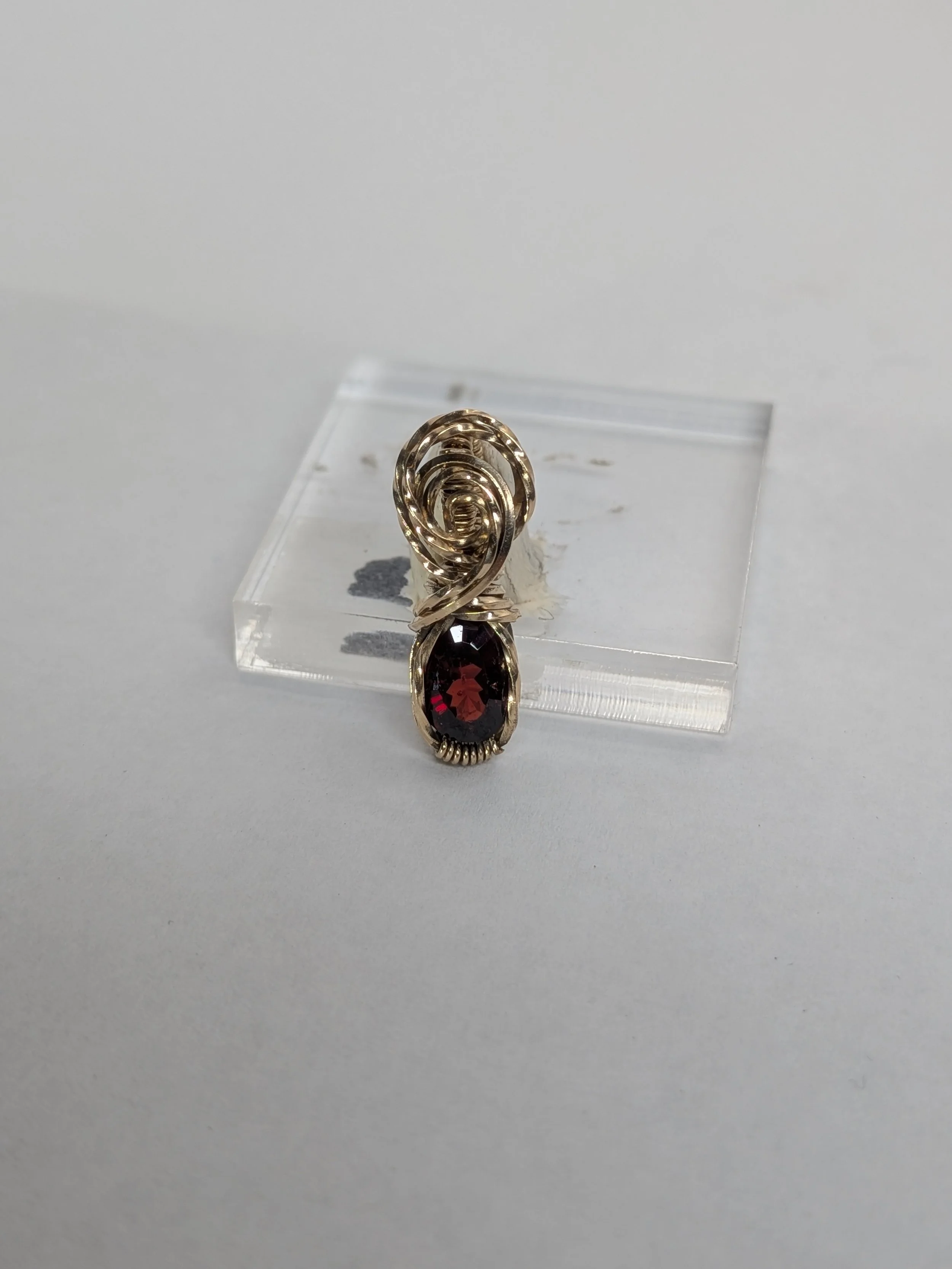 Gorgeous petite gemstone pendant, intricately wire-wrapped and accented with a heart-style bail, beautifully highlighting the stone as the centrepiece.