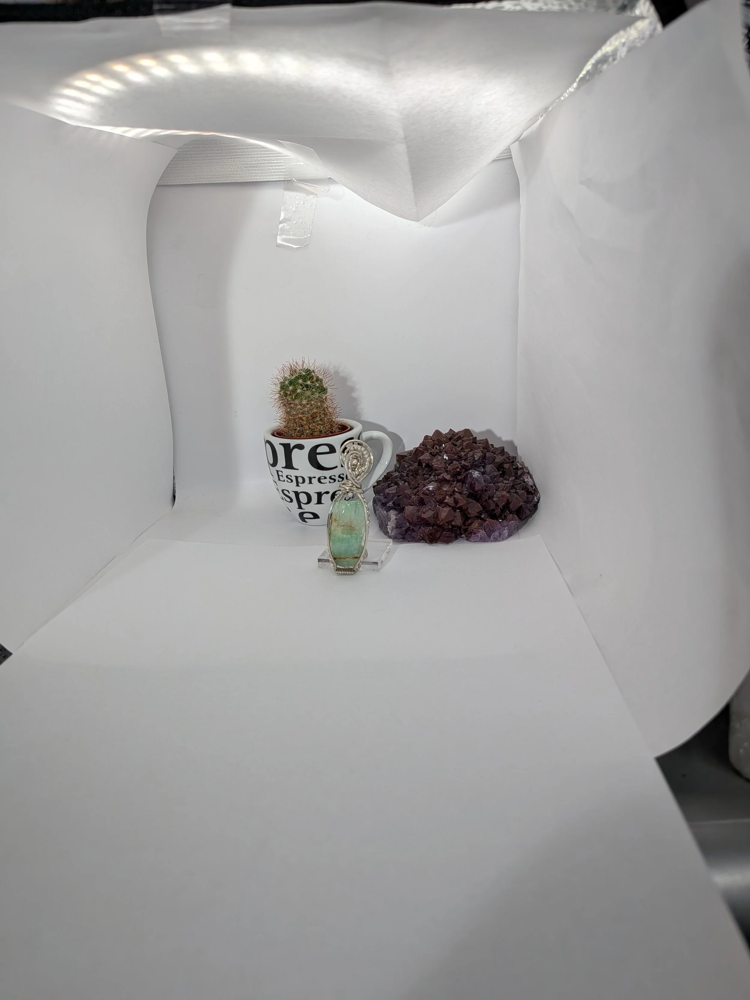 Sterling silver wire wrapped large green calcite gemstone, adorned with small silver beads for an elegant finish.