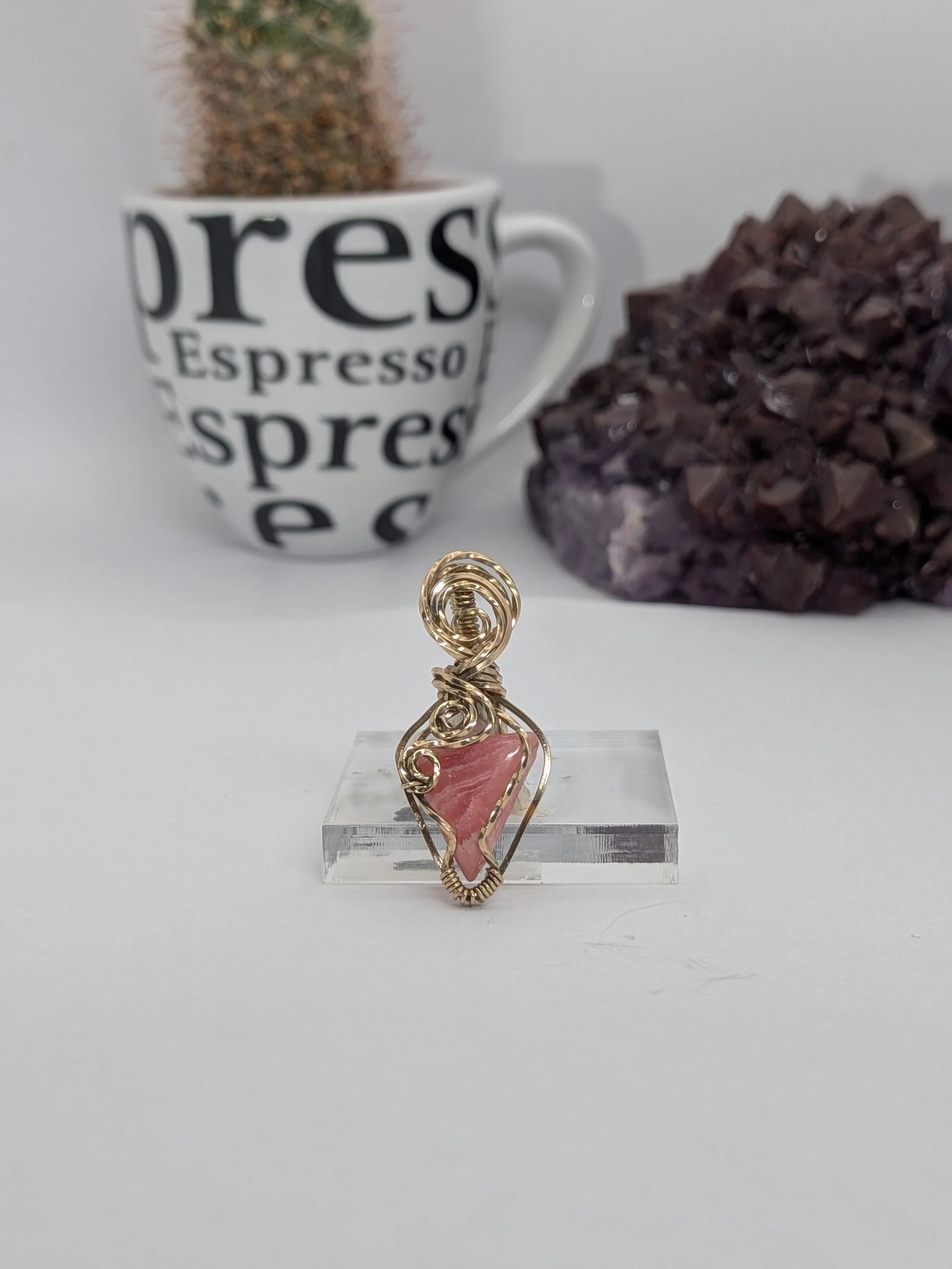 Gorgeous petite gemstone pendant, intricately wire-wrapped and accented with a heart-style bail, beautifully highlighting the stone as the centrepiece.