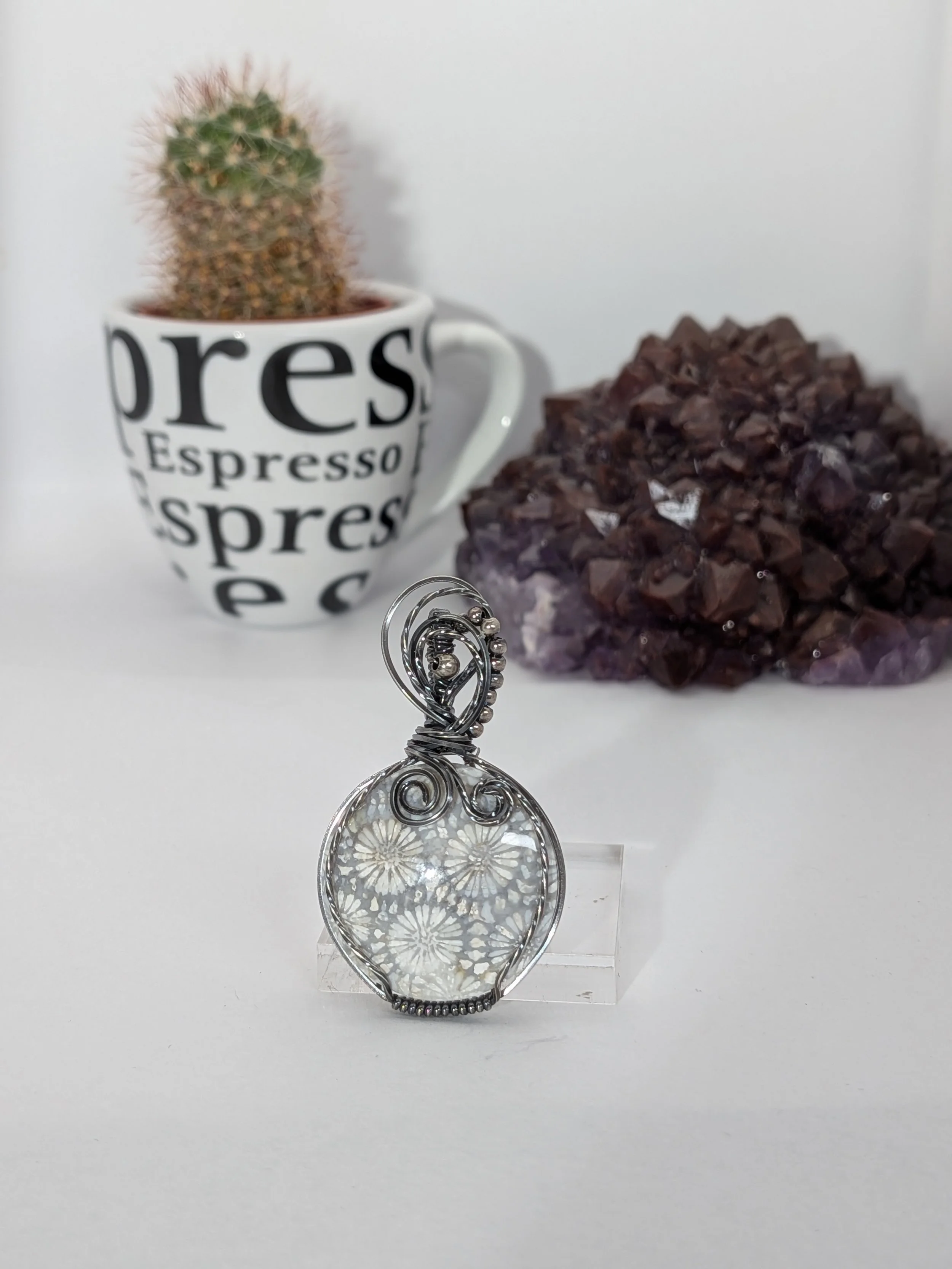 Gorgeous petite gemstone pendant, intricately wire-wrapped and accented with a heart-style bail, beautifully highlighting the stone as the centrepiece.