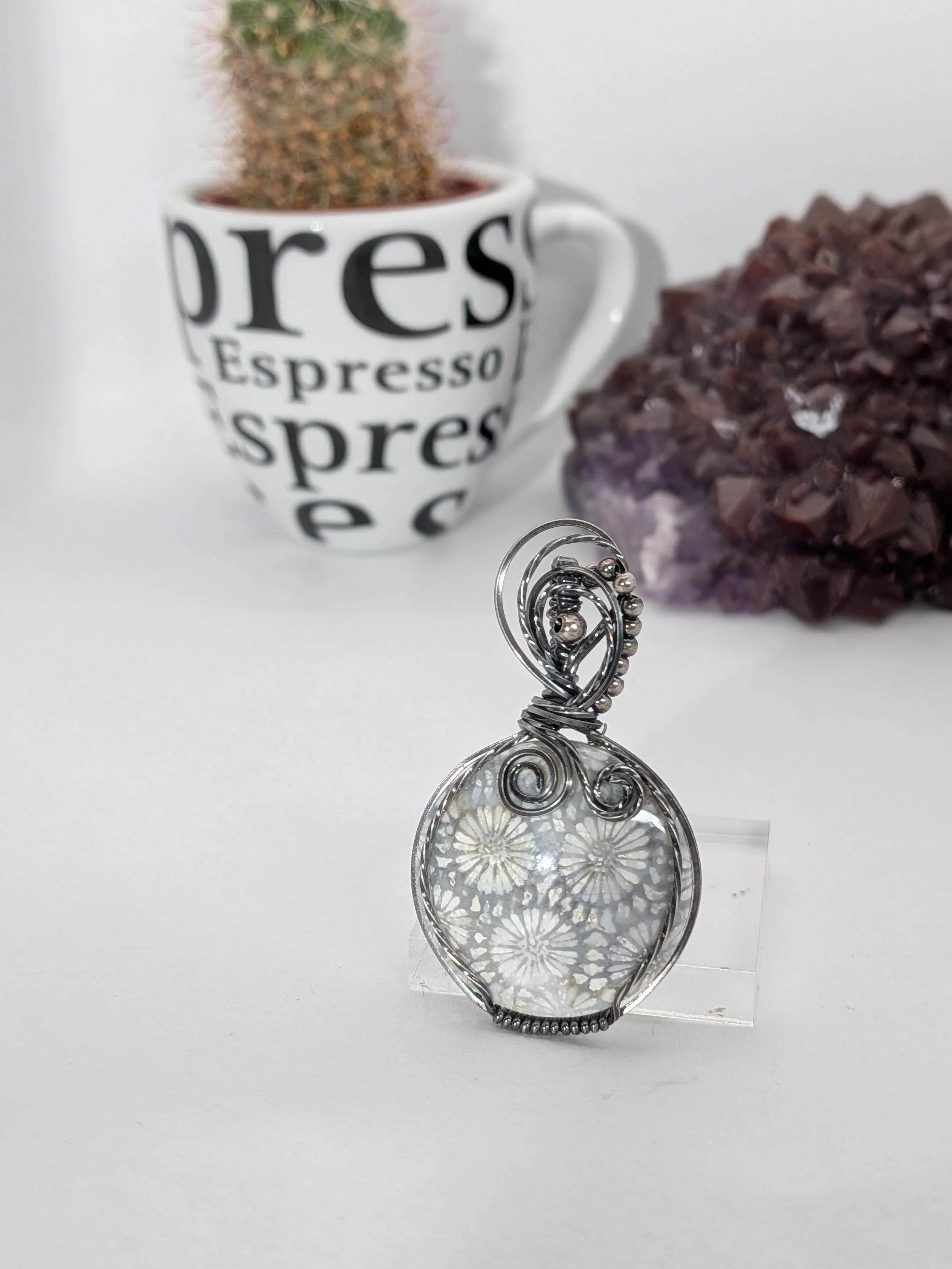 Gorgeous petite gemstone pendant, intricately wire-wrapped and accented with a heart-style bail, beautifully highlighting the stone as the centrepiece.