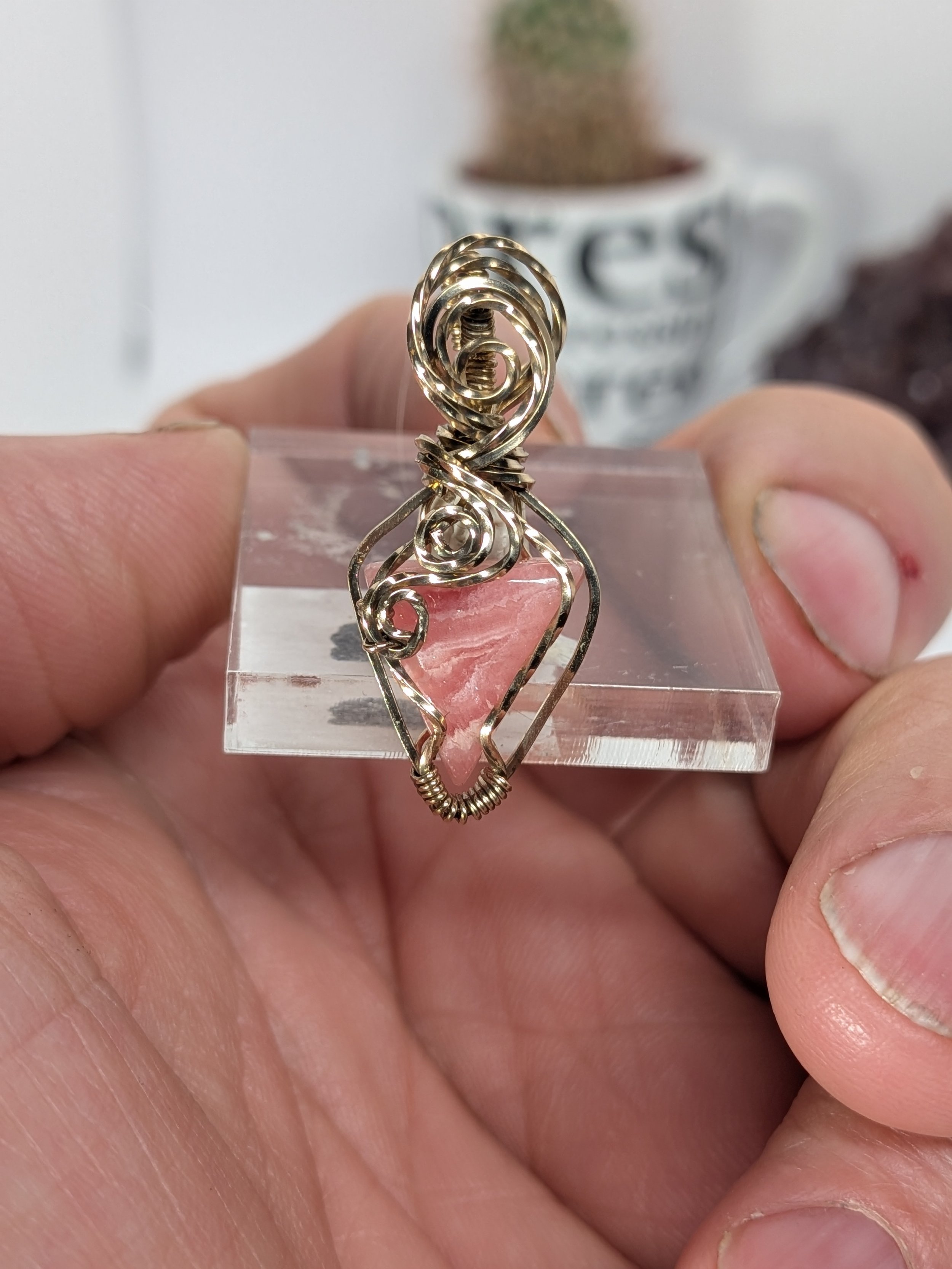 Gorgeous petite gemstone pendant, intricately wire-wrapped and accented with a heart-style bail, beautifully highlighting the stone as the centrepiece.