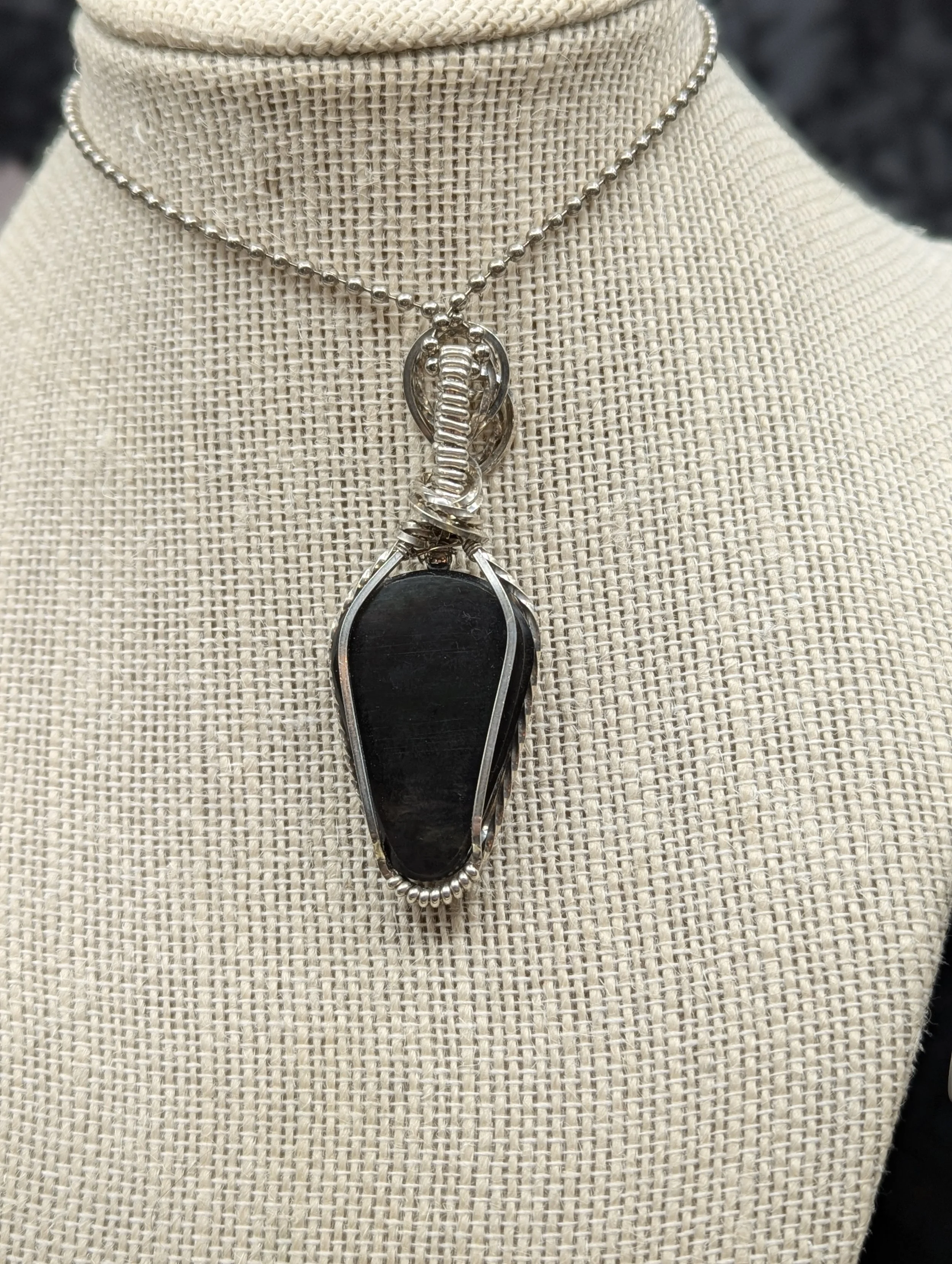 Peacock Obsidian repels negative energy and overflows with positive energy for those who carry it. It's like the sunshine through the dark stormy clouds, clearing past obstacles for a brighter future.