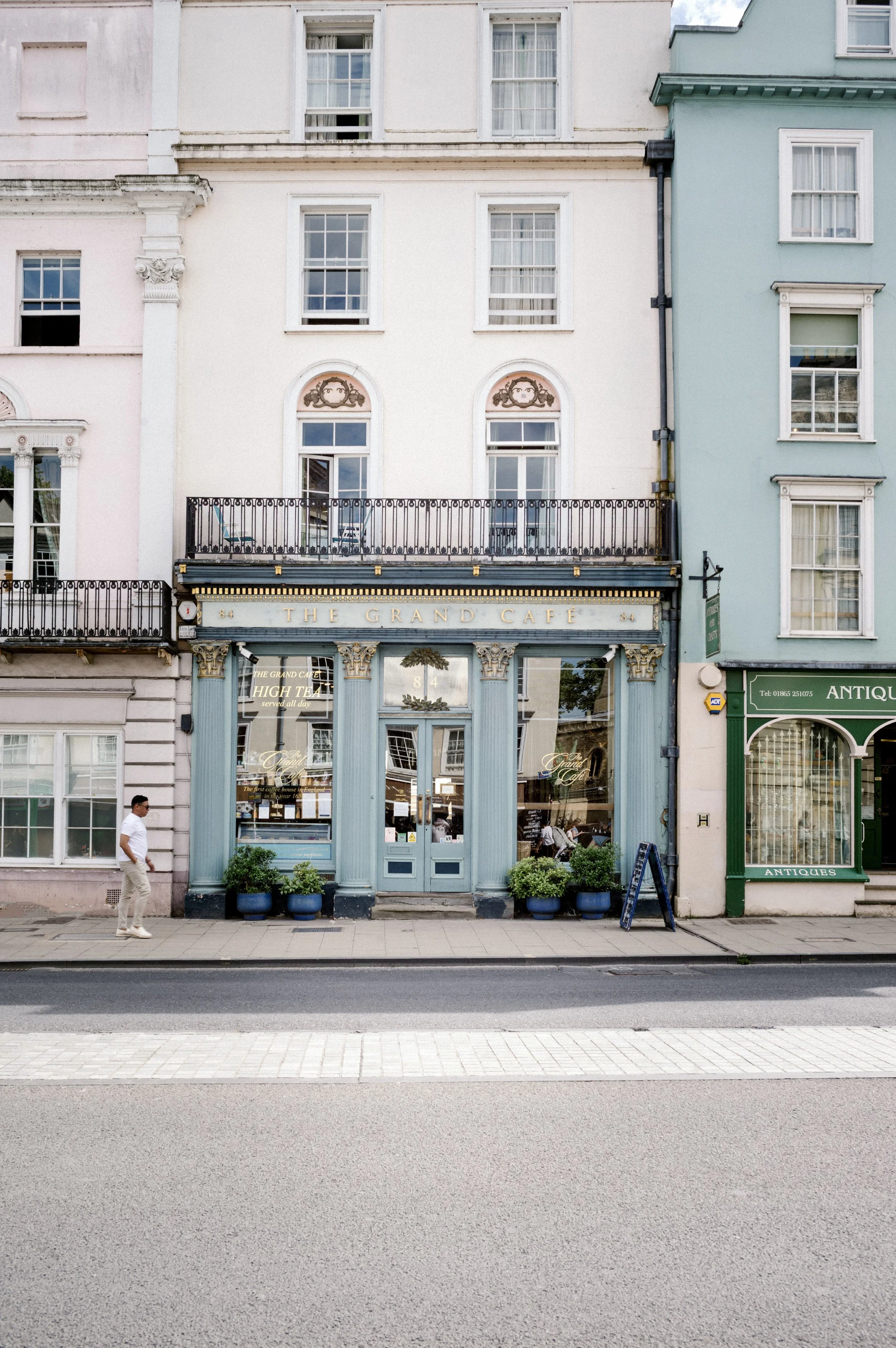 Powder-blue frontage of The Grand Café on Oxford High Street, site of England's first coffee house