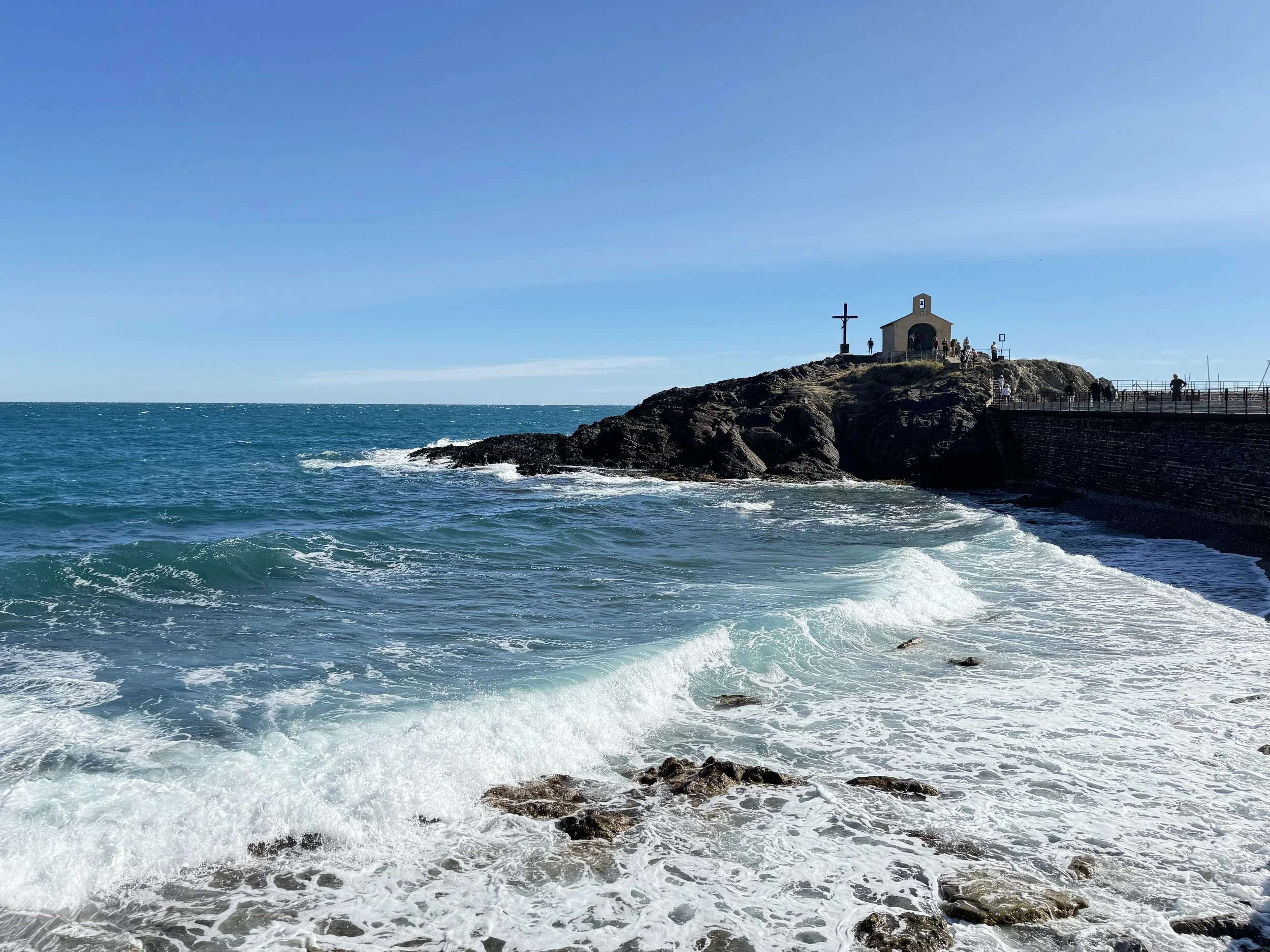 Chapel of Saint Vincent in Collioure – rocky outcrop with ocean waves