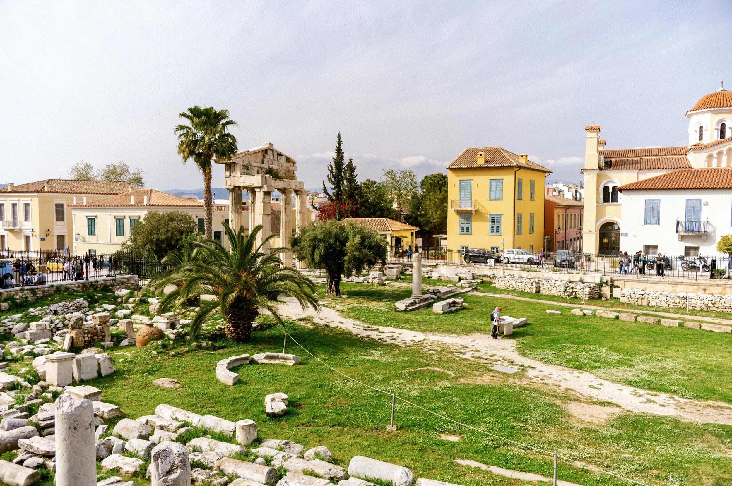 Ruins of the Roman Agora in Athens Greece with ancient stone columns and archway