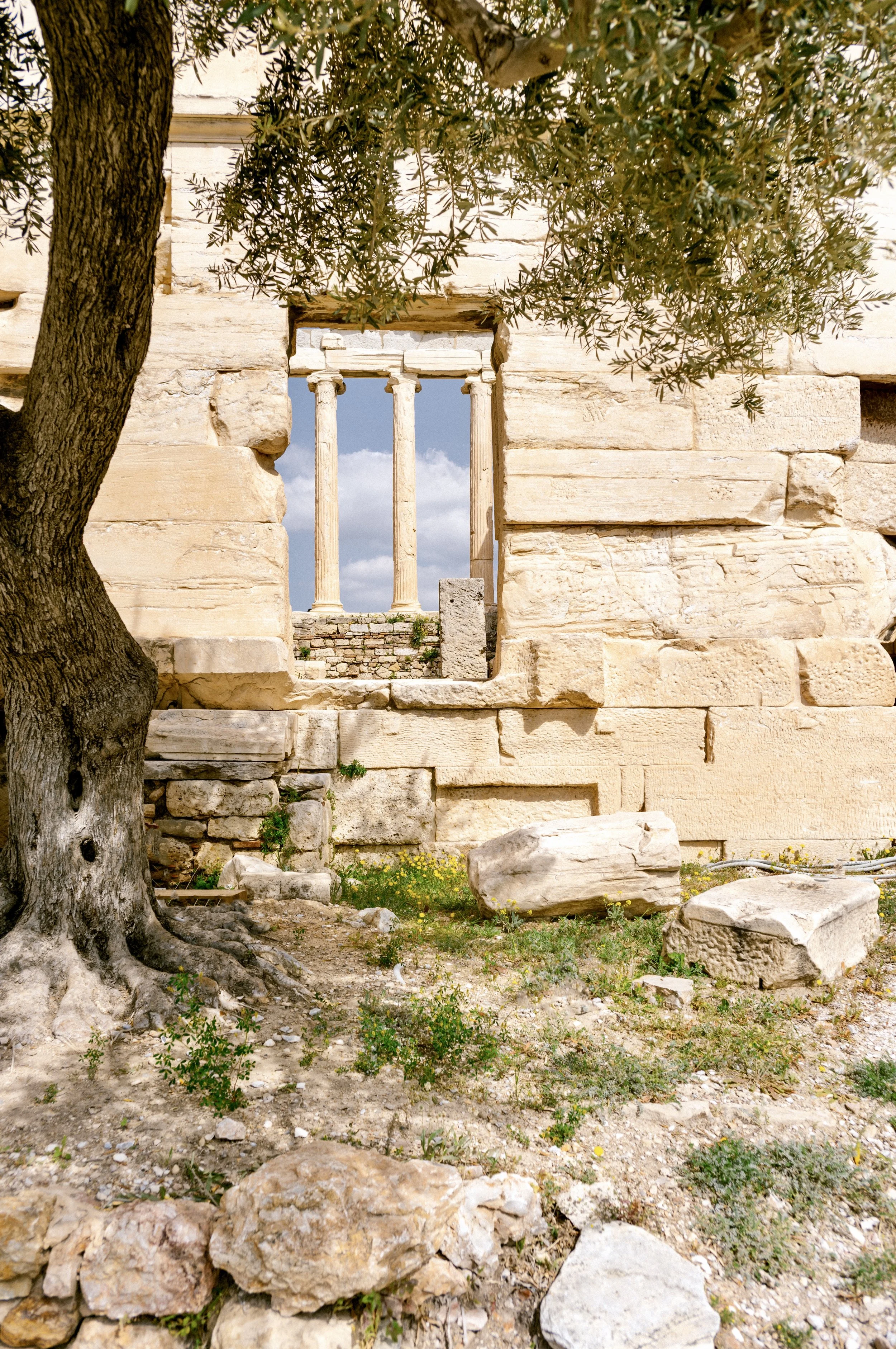 Stone window detail of the Erechtheion temple on the Acropolis of Athens Greece