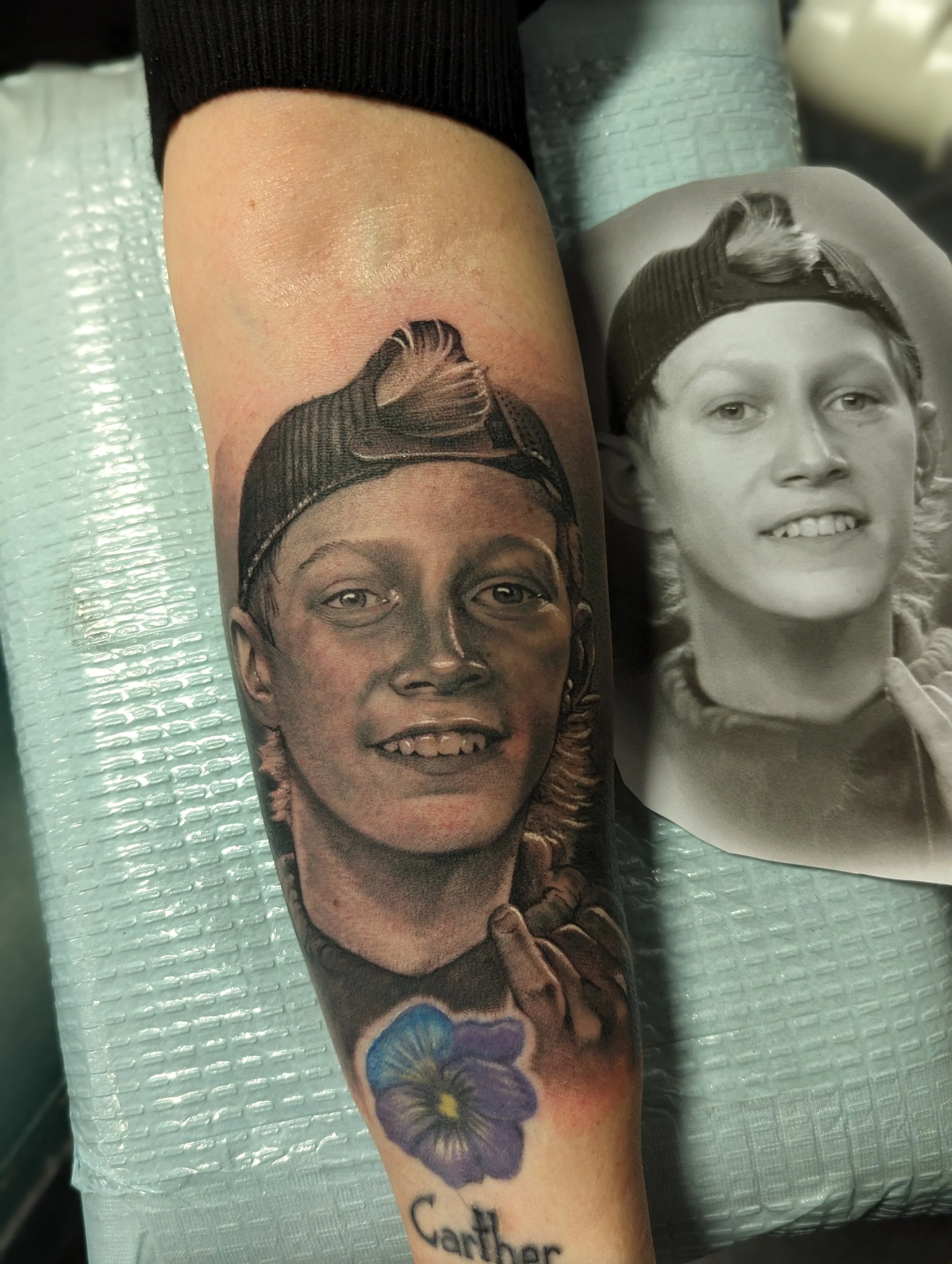 black and grey portrait of young boy