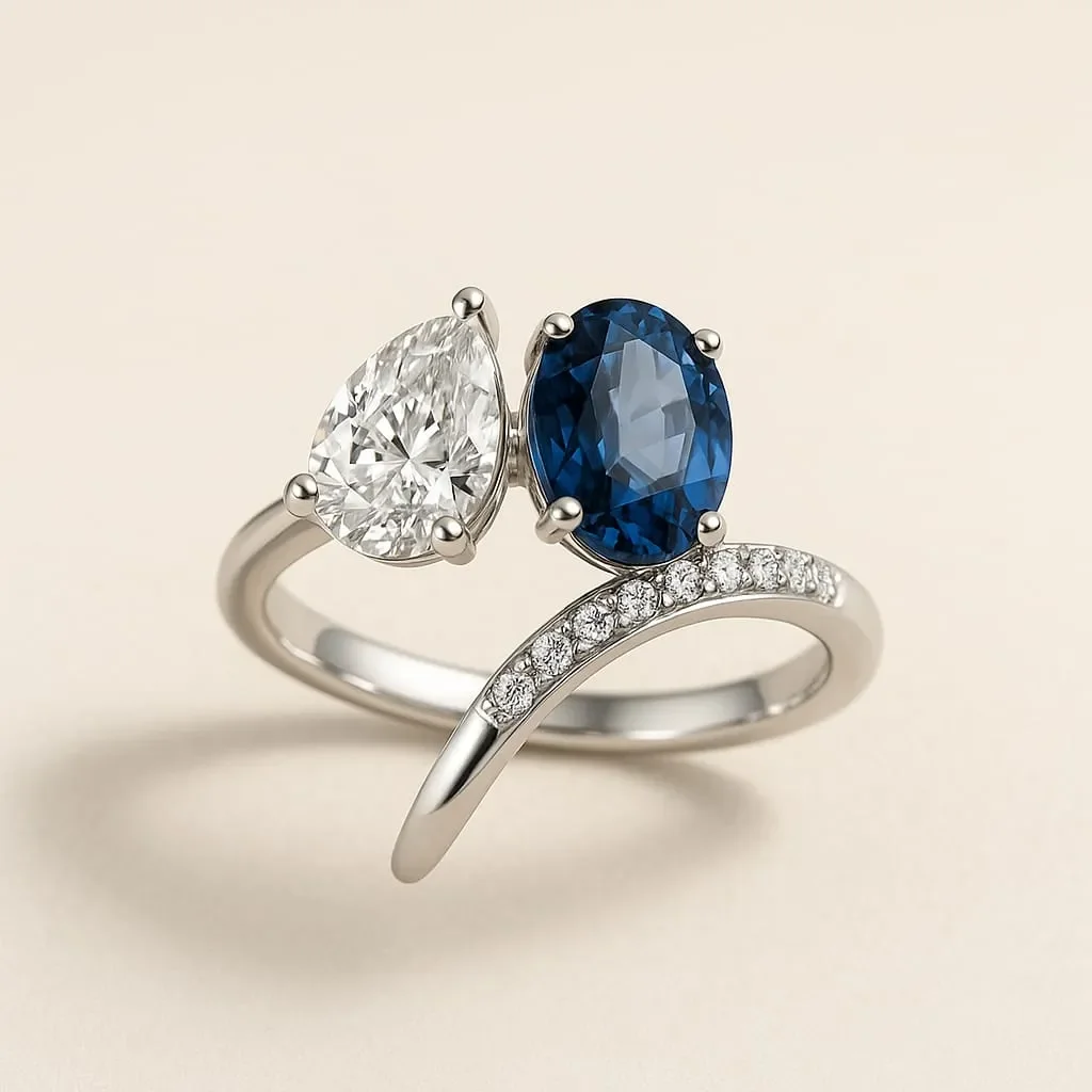 Toi et Moi engagement ring with diamond and blue sapphire designed by Layaz