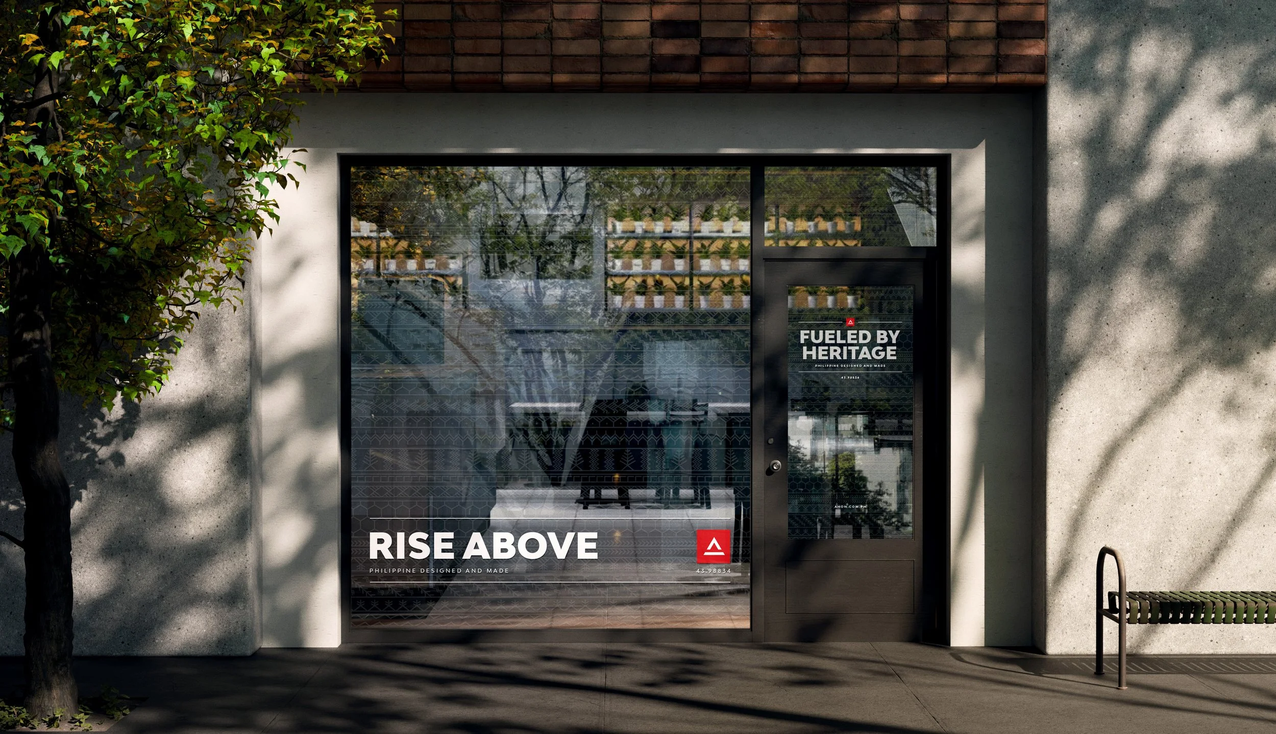 Ahon storefront mockup with Rise Above window graphics, a red logo and Fueled by Heritage lettering on the door.