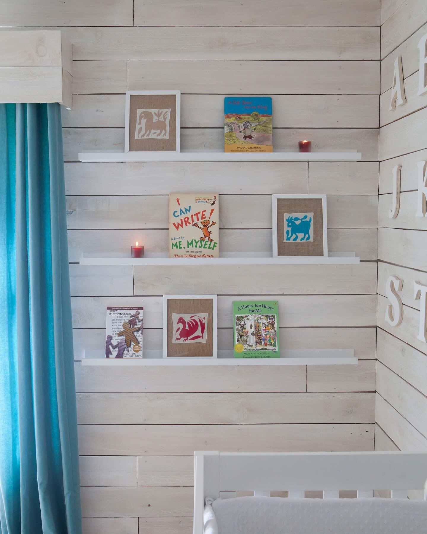 I had so much fun putting together this nursery!! The wood walls I had installed with a white stain, are so pretty reflecting the light. While the velvet curtains and sheepskin rug added coziness to the space. 🤍🤍🤍 #genderneutralnursery #nurserydes
