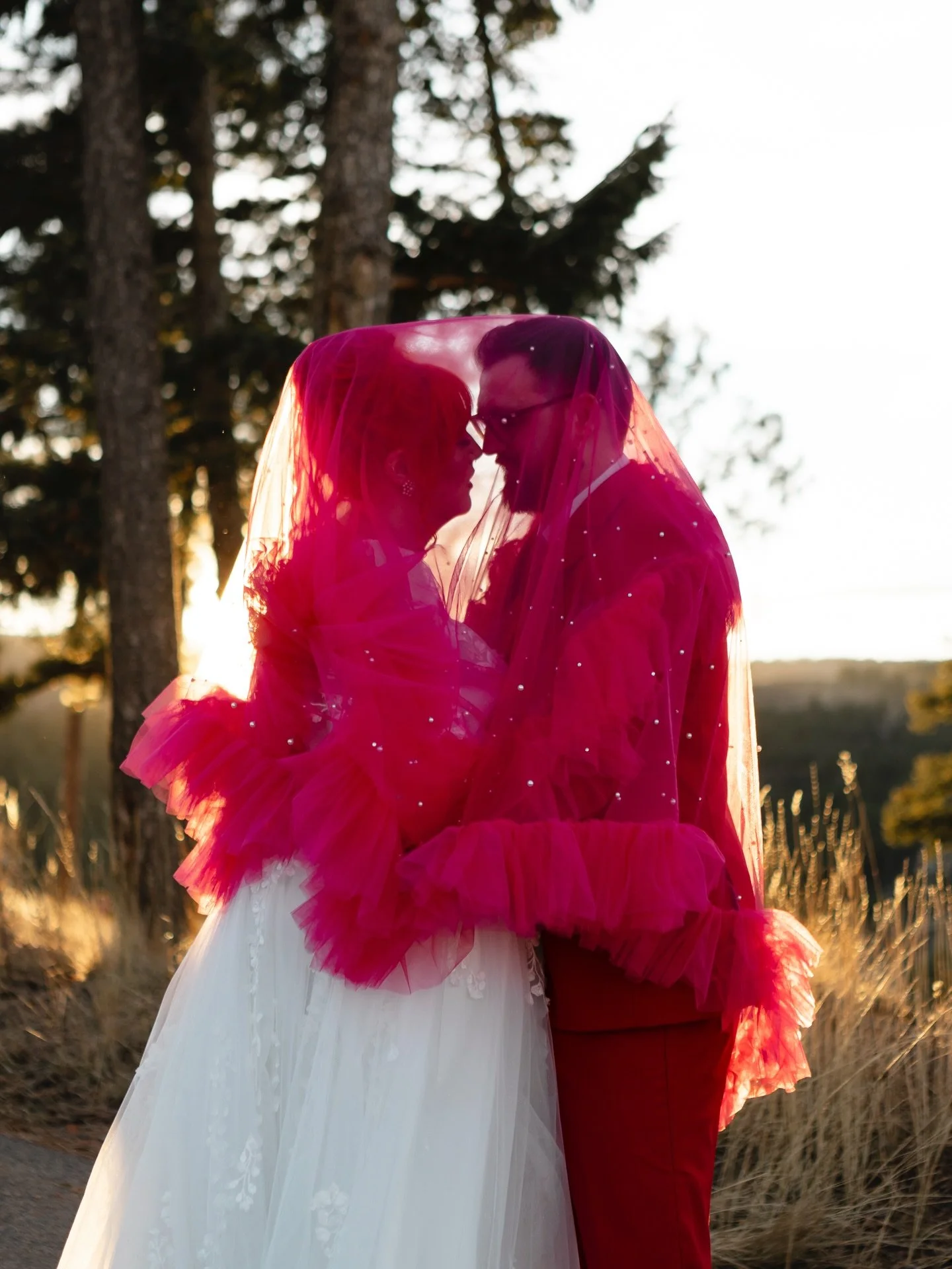 Golden hour plus a pink veil? You have got to be FREAKING kidding me 😍😍😍

Everything about this wedding was exactly what a wedding should be. A perfect depiction of this amazing couple and their life together. And, it was a totally unique wedding 