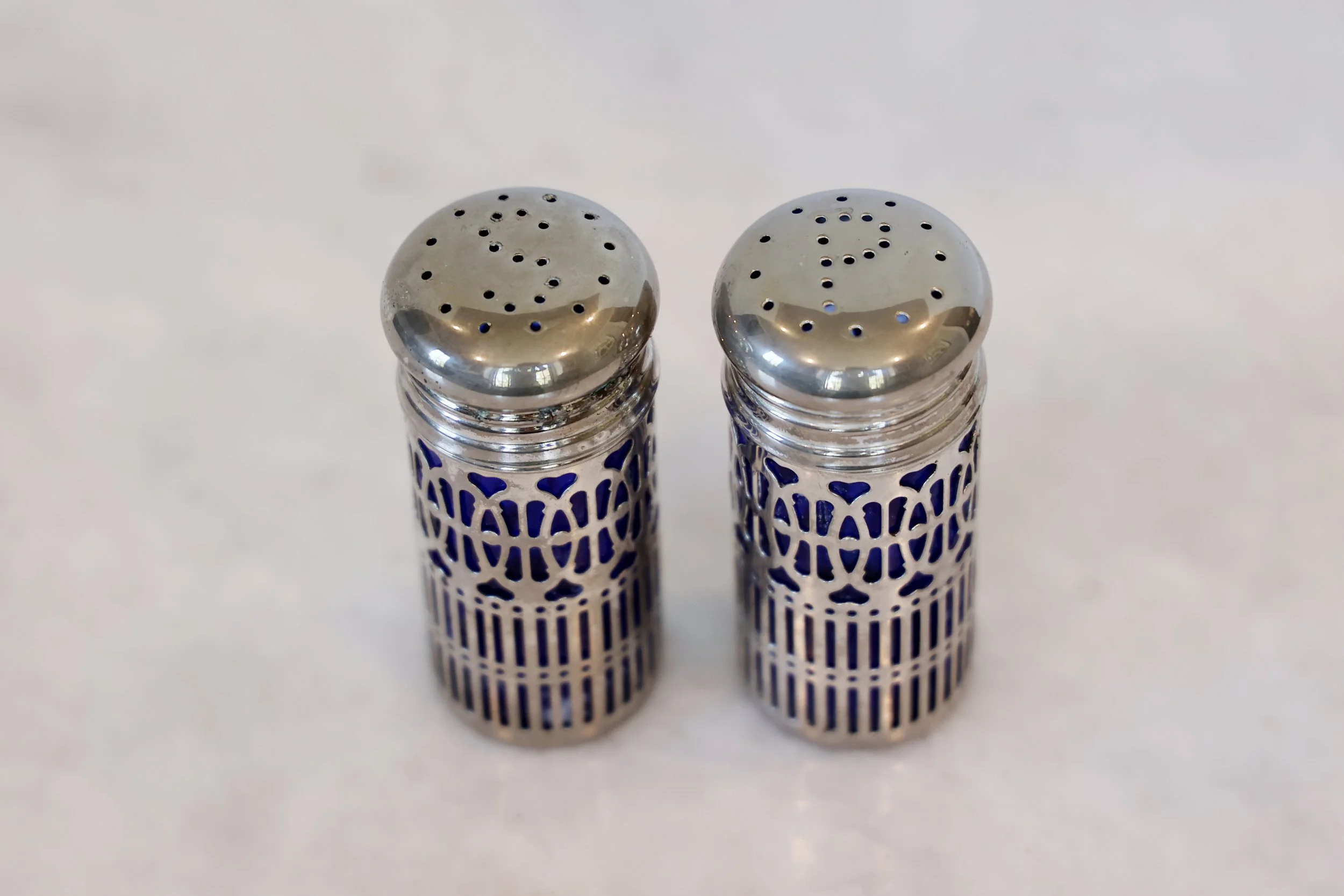 VINTAGE BLUE GLASS AND SILVERPLATE SALT AND PEPPER SHAKERS 