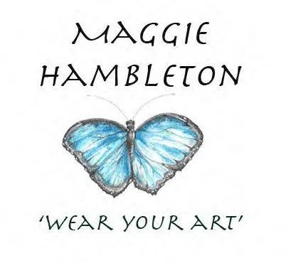 Book cover titled 'Wear Your Art' by Maggie Hambleton with a blue butterfly illustration.