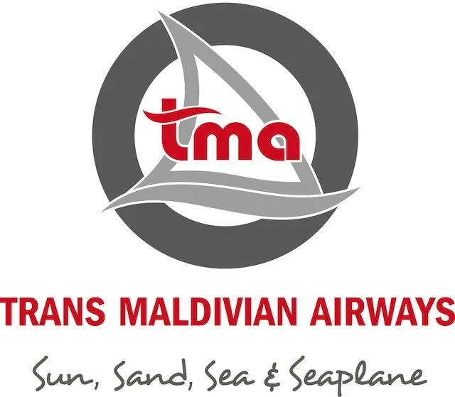 Logo for Trans Maldivian Airways featuring a circular navigation device with a stylized boat and the text "trans MALDIVIAN AIRWAYS" and "Sun, Sand, Sea & Seaplane".