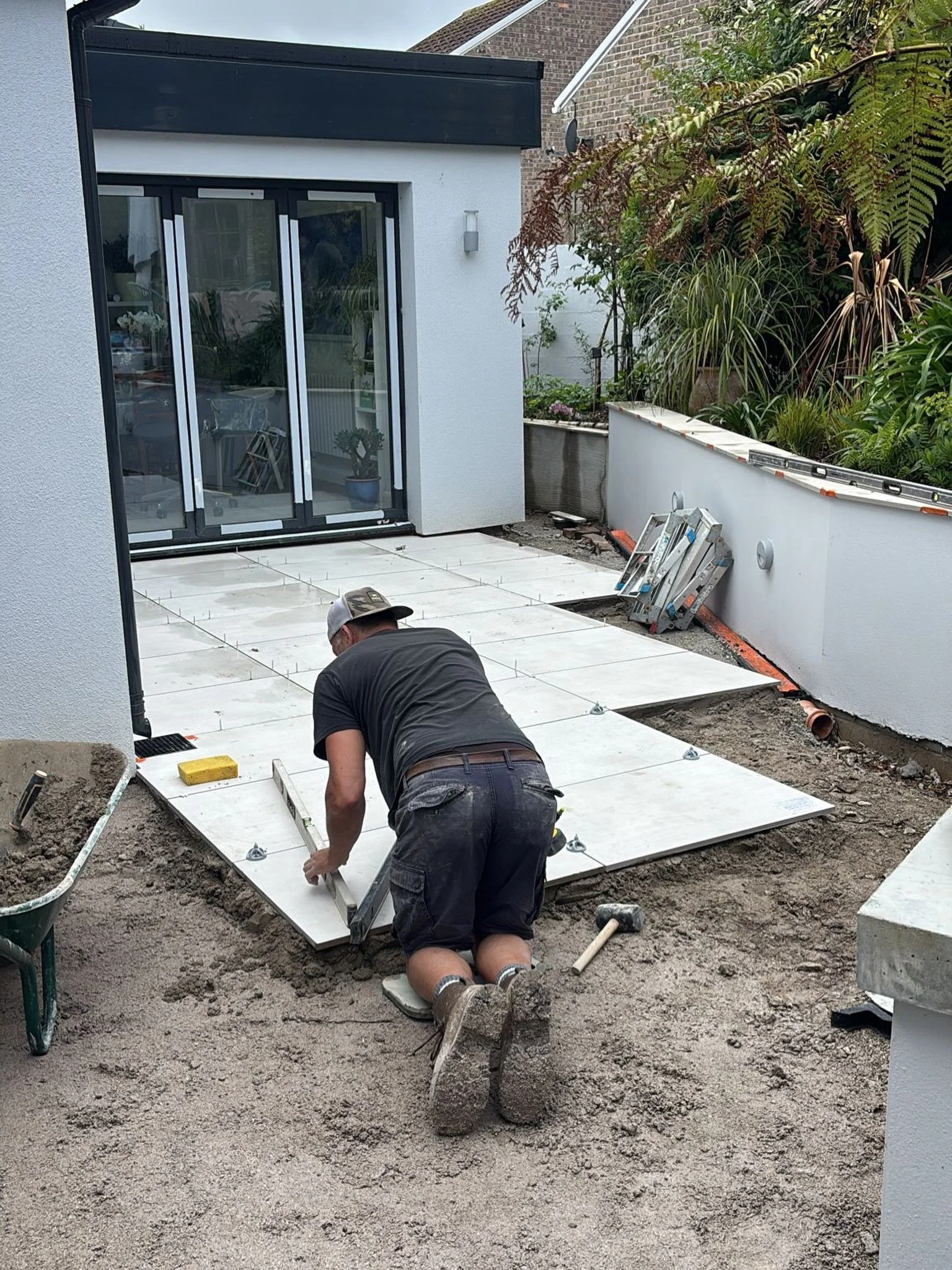 Looks simple, doesn&rsquo;t it?

A few slabs.

A spirit level.

A bit of sand.

The reality is every slab needs to be level, aligned and sitting exactly where it should be.

The finished patio is only ever as good as what&rsquo;s underneath it.

Tom 