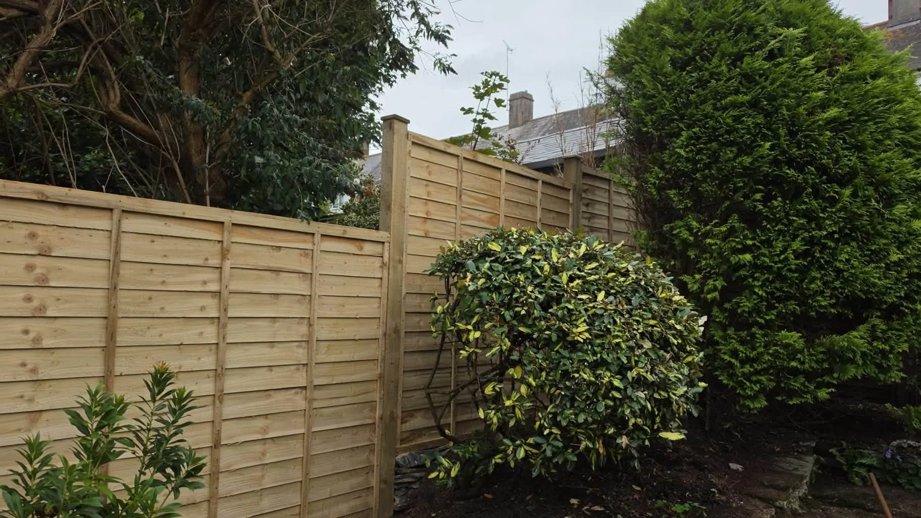 New timber garden fencing installed as part of a landscaping project in Cornwall