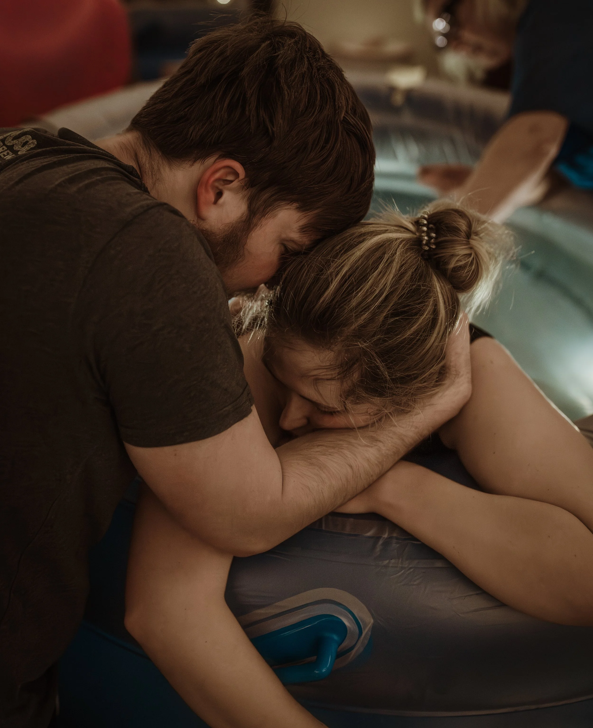Water birth at home in Glasgow, documented by birth photographer Marieke