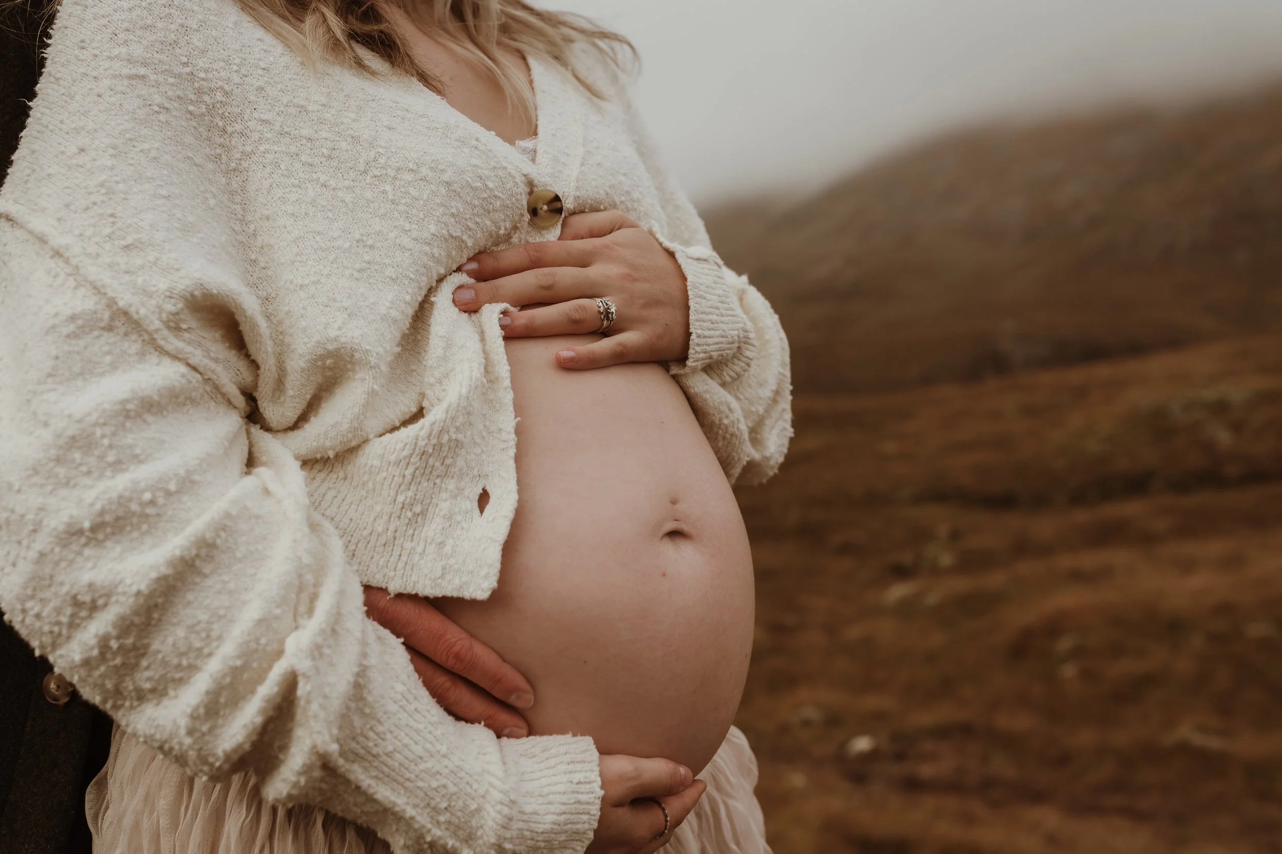 Pregnant mother standing in Glencoe during maternity photoshoot Scotland