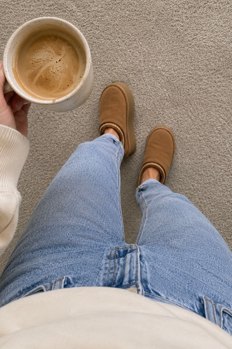 Image of woman holding coffee