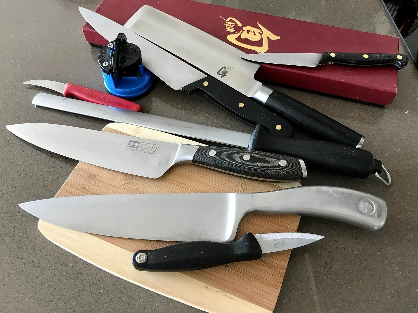 Selection of knives on a kitchen worktop