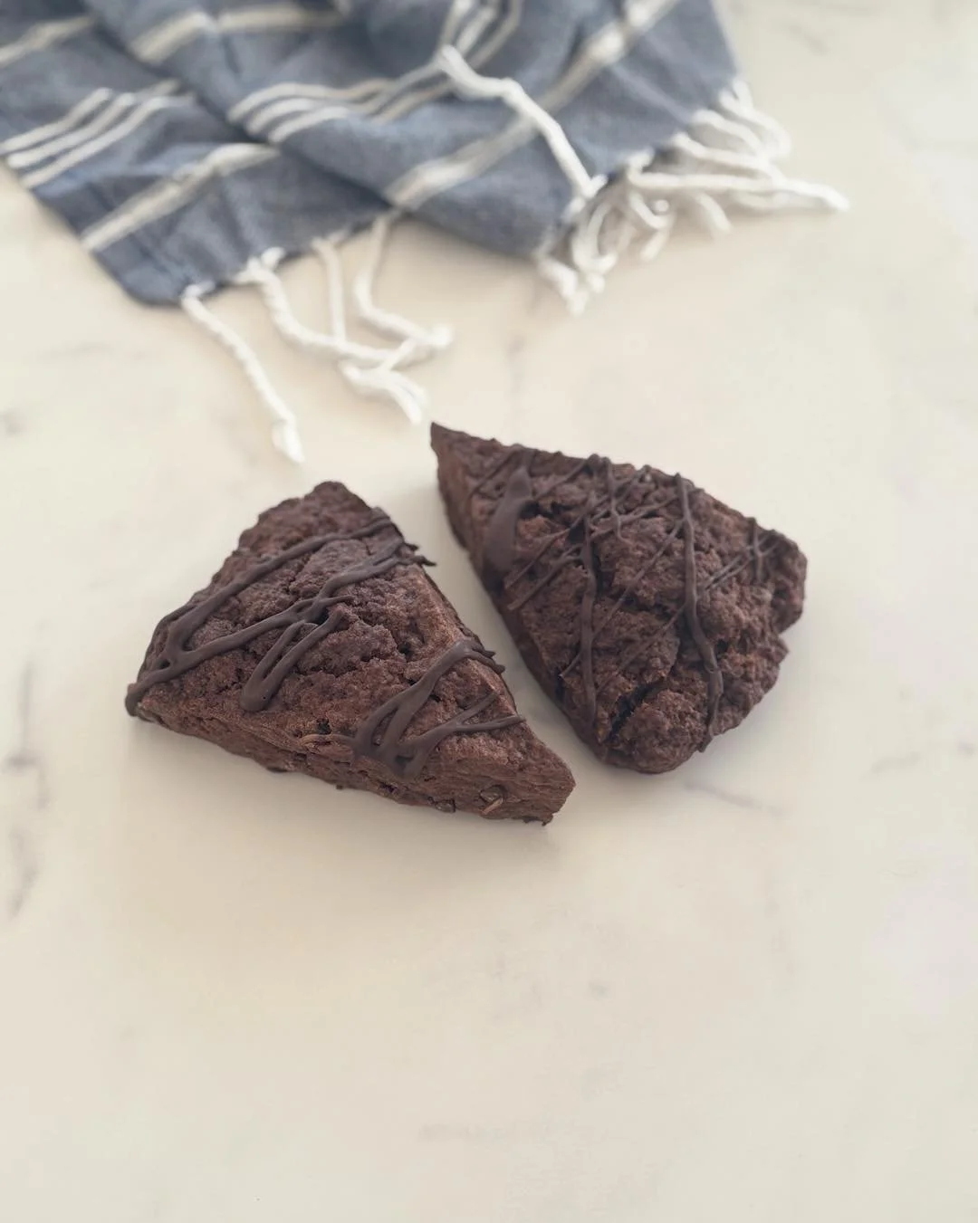 Deep, rich Dutch cocoa and chocolate chips in every bite, and finished with a chocolate drizzle on top. These Chocolate Fudge Scones are soft, fudgy, and truly bursting with chocolate.

If you&rsquo;re a chocolate lover, this one&rsquo;s for you.

La
