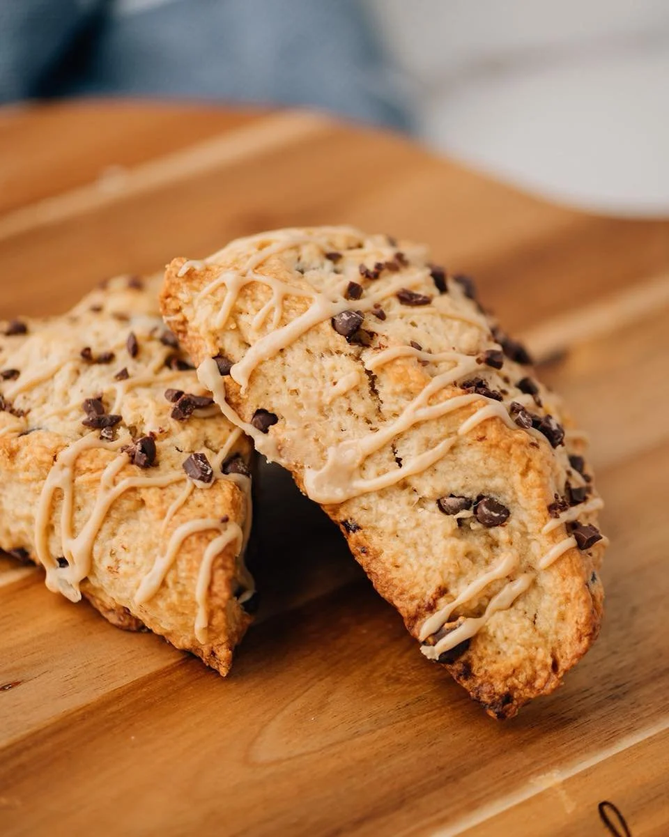 Mocha Chip Scones 🍫☕️
Bold espresso and creamy chocolate folded into a tender, buttery scone - chocolate in every bite, finished with a silky espresso drizzle. 
Made with organic butter, sugar, and flour, and real chocolate chips with just three sim