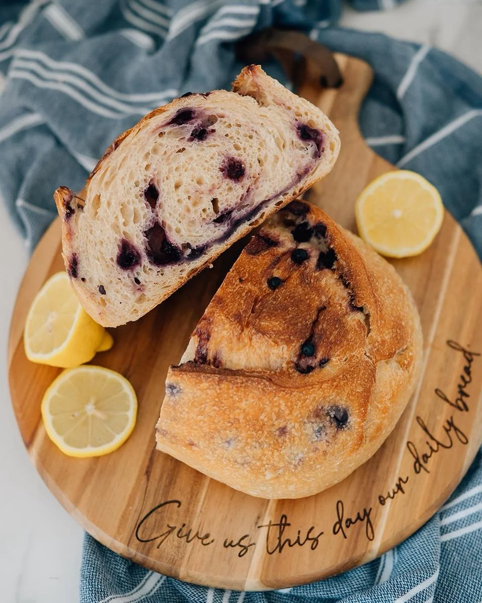 Lemon Blueberry Sourdough

Every loaf is made with wild blueberries because they have a deeper, more concentrated flavor.
Fresh lemon zest and juice bring the perfect spring freshness, with just a touch of maple syrup that pulls everything together.
