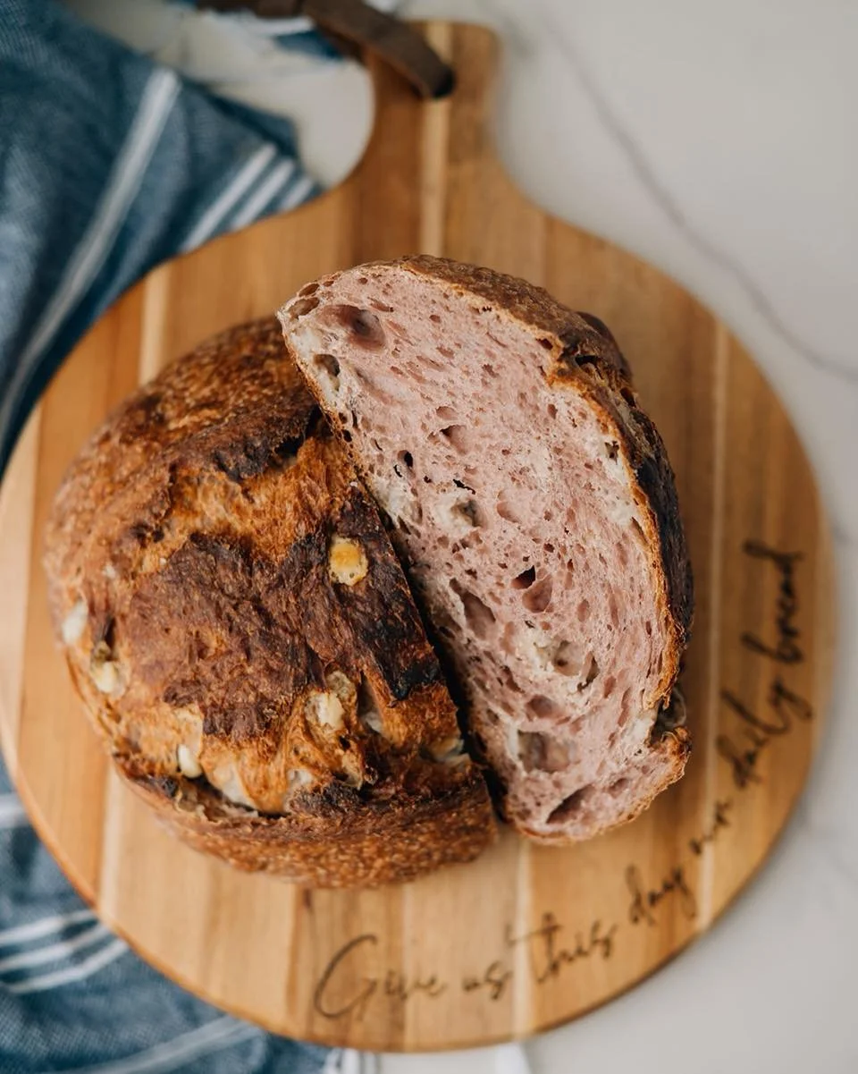 Raspberry White Chocolate Sourdough - May&rsquo;s seasonal flavor. 

Real raspberries are worked into the dough, giving this loaf its beautiful natural pink color and a deeper, more concentrated flavor in every bite. White chocolate chips melt into p
