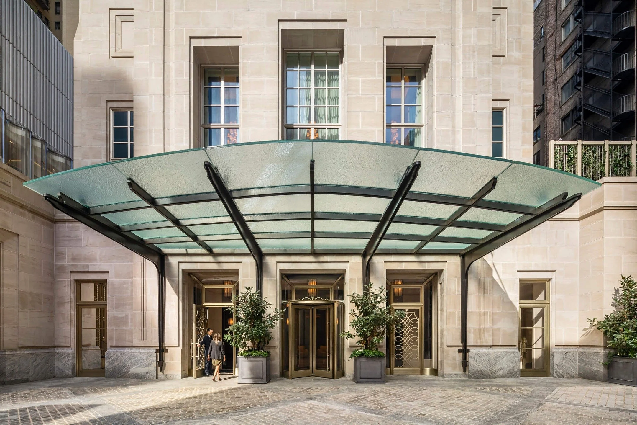 Symmetry is the secret language of luxury. 🏛️✨

Framing the motor court at 220 Central Park South, these twin Maryvale planters offer a masterclass in curb appeal. Against the backdrop of custom Alabama limestone and bronze detailing, the greenery a