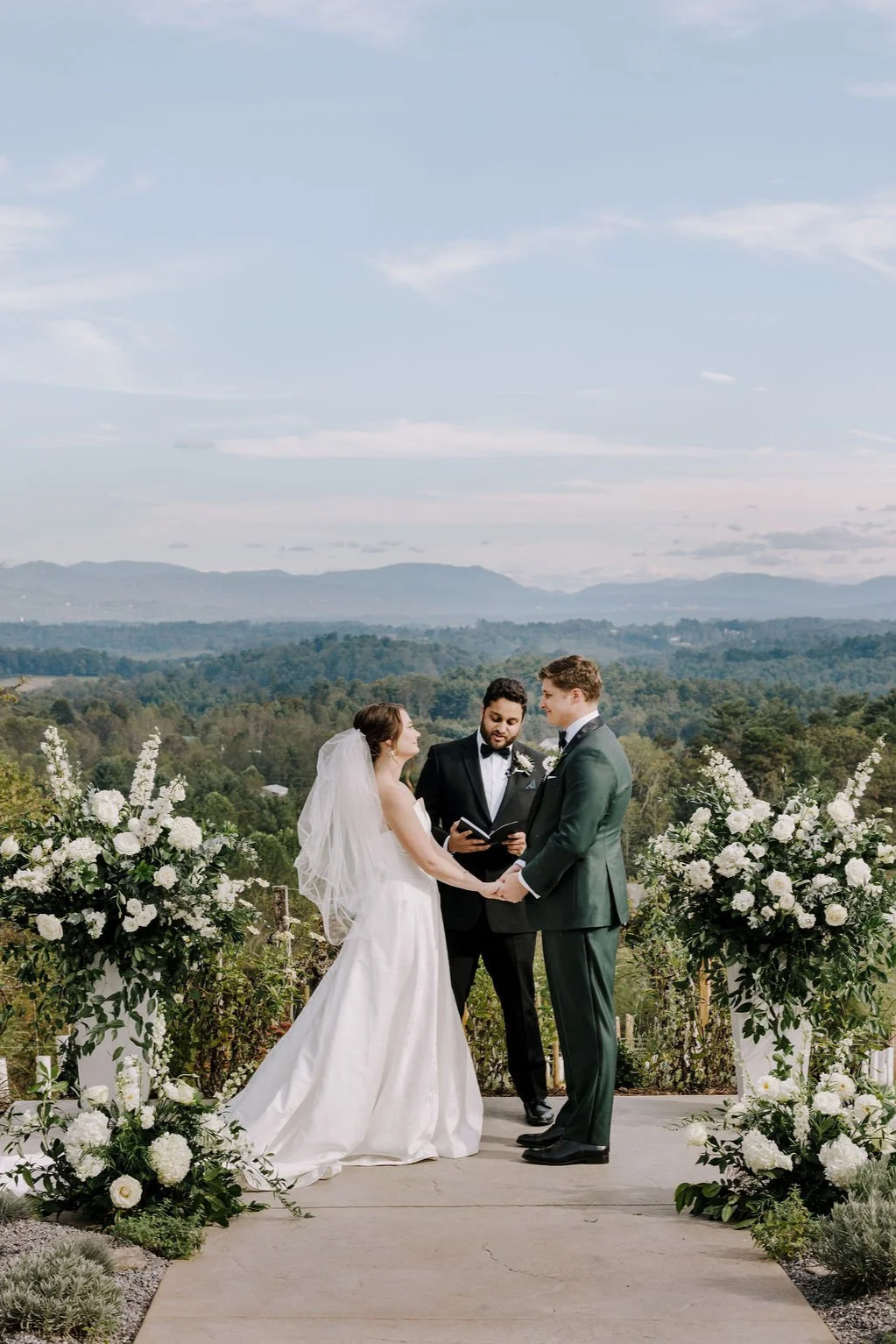 Moountain view wedding ceremony at Longleaf Vineyard in Marshall, North Carolina with Blue Ridge Mountain views