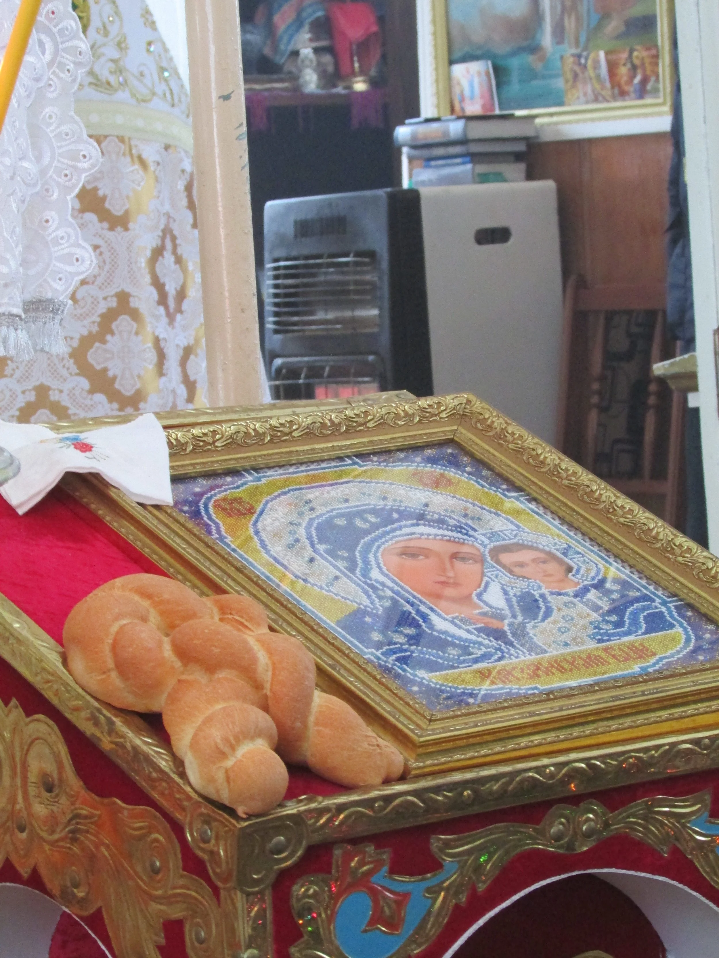   Christmas loaf and icon for Christmas service at Codreni village church  