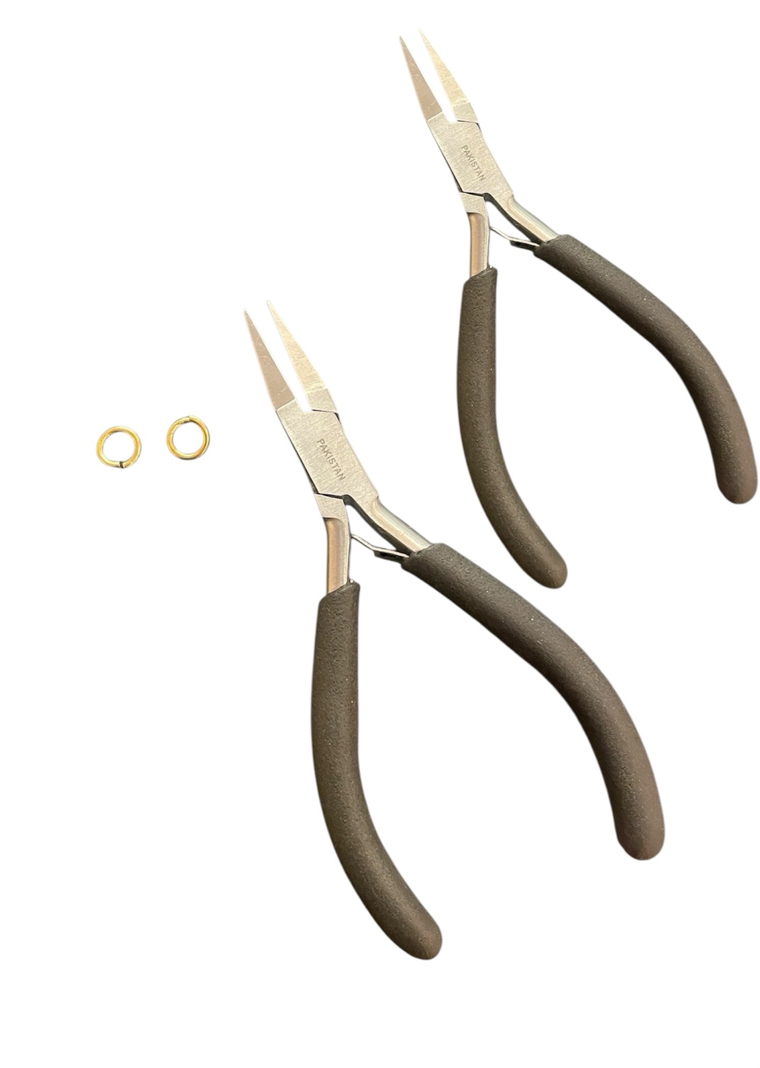 Pair of surgical forceps with black handles and two small gold rings on a white background.