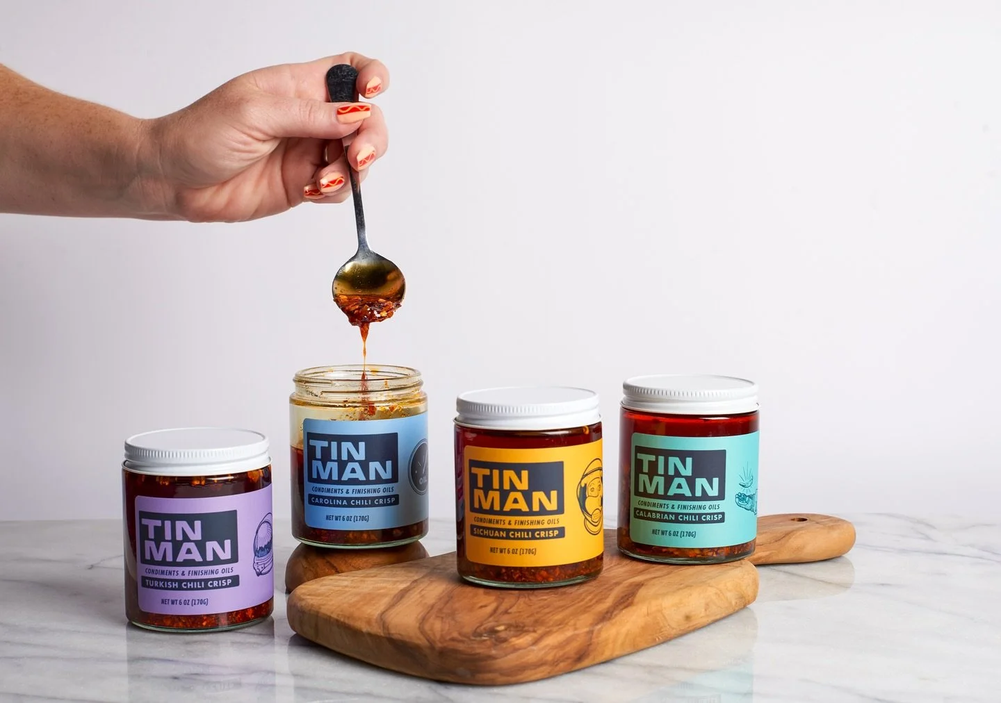 A while back, we headed to @dhanrajemanuel studio to shoot product photos for @tinmanoils with the amazing @ambertookit! Amber crushed it as both lighting assist and hand model (peep those hot dog 🌭 nails). These shots were created to launch @tinman