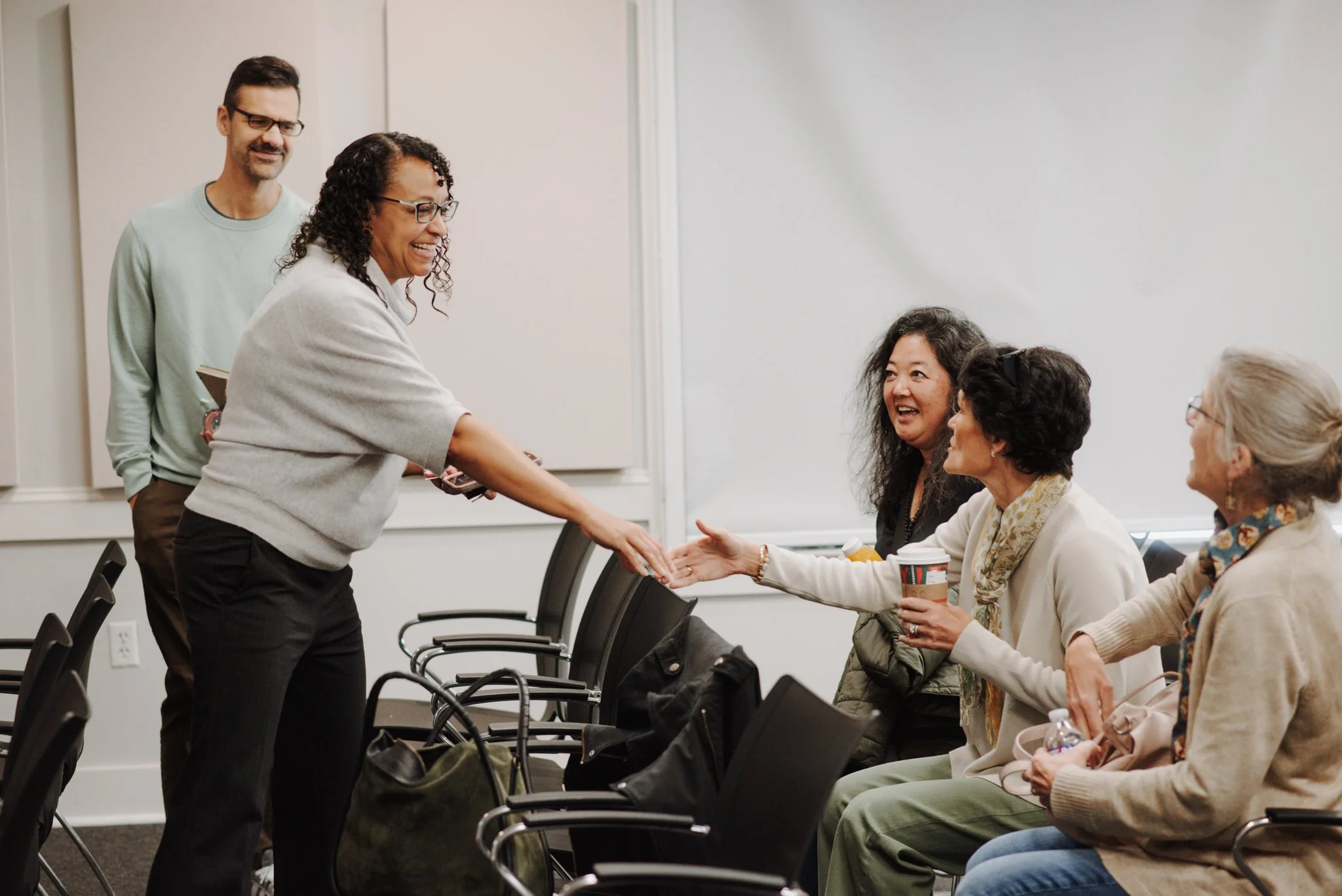 Director Dilsey Davis greets people at a film screening of 13 Demands: The Allen Building Takeover
