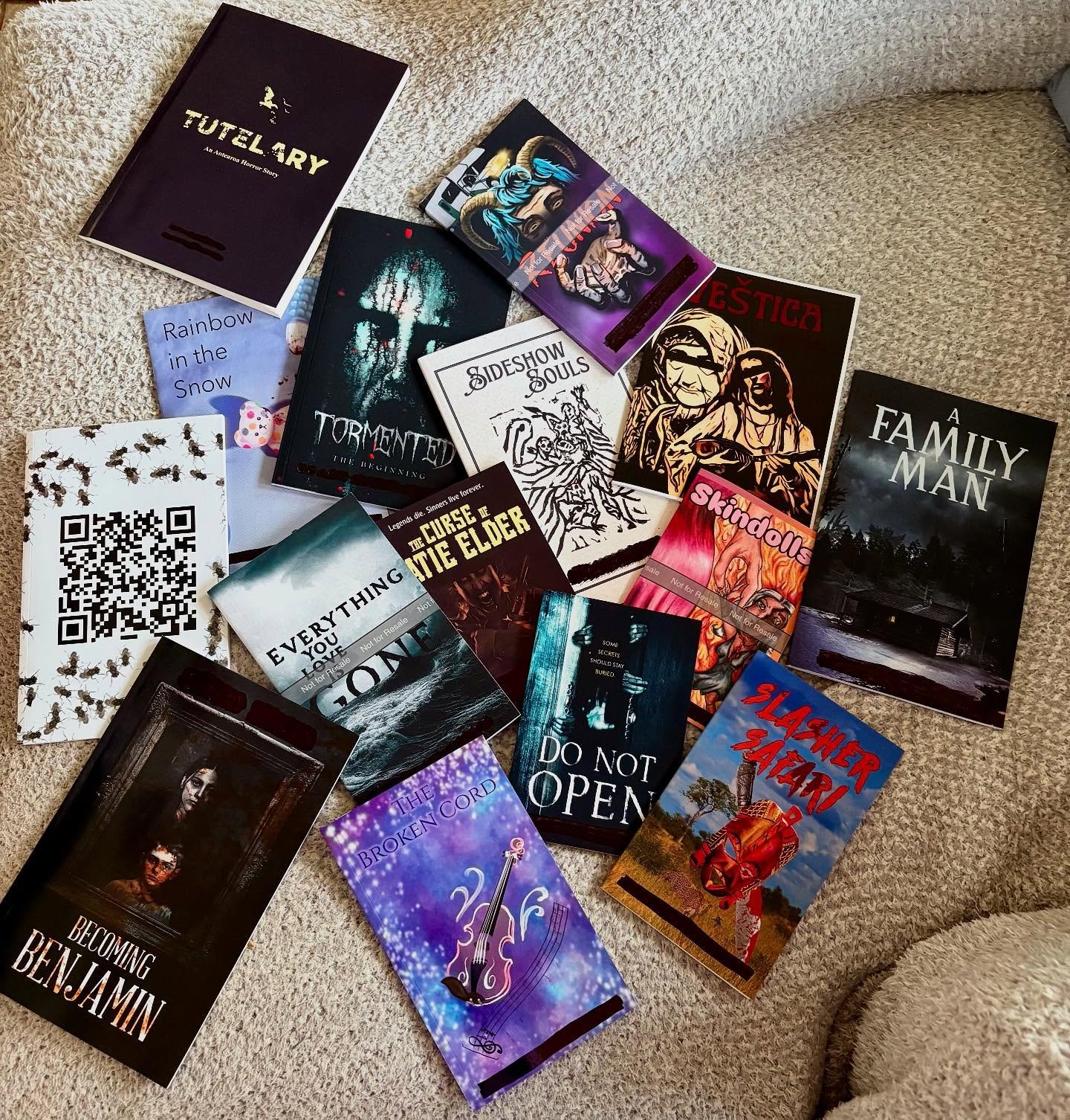 I have a pile of THE coolest chapbooks, as one of the judges for a competition sponsored by Dead Tree Terror! They are gorgeous, and I can't wait to dive in headfirst!