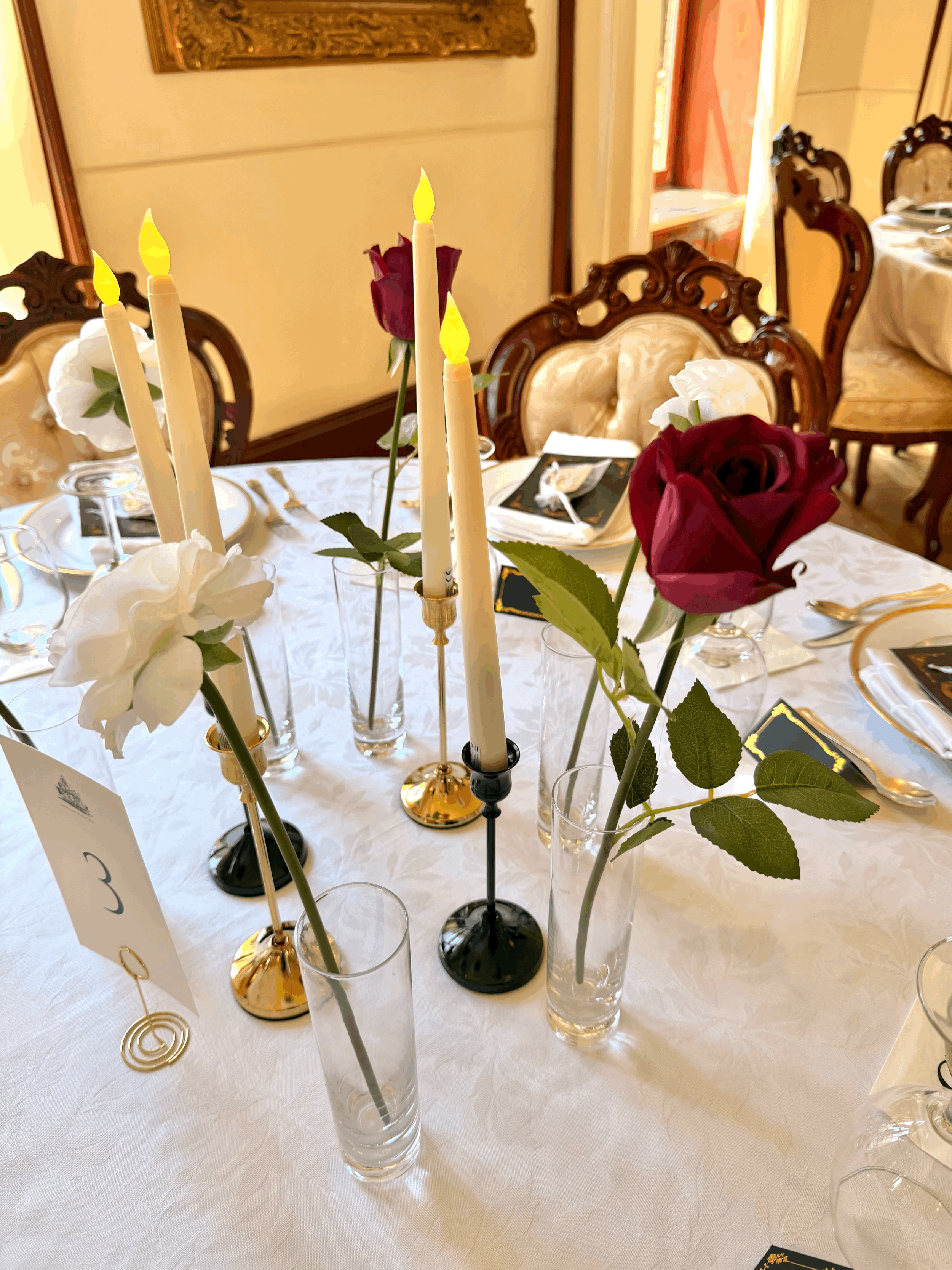 50 burgundy buds centerpiece (enough for 10 tables)